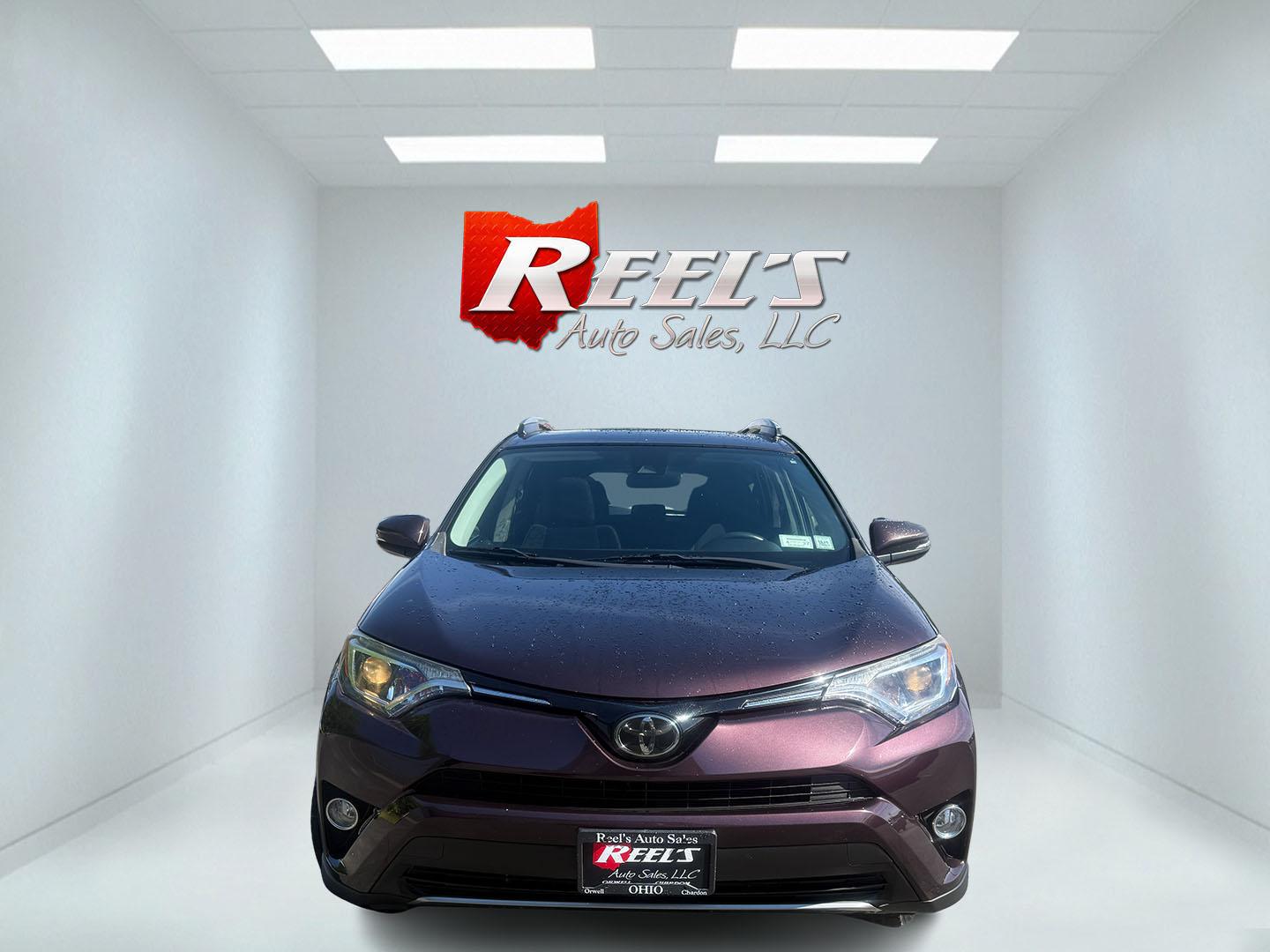 2018 Purple /Black Toyota RAV4 XLE AWD (2T3RFREV6JW) with an 2.5L I4 DOHC 16V engine, Automatic transmission, located at 547 E. Main St., Orwell, OH, 44076, (440) 437-5893, 41.535435, -80.847855 - 2018 Toyota RAV4 XLE AWD – Reliable, Efficient, and Loaded with Safety and Convenience! This clean 2018 Toyota RAV4 XLE AWD is a smart, well-rounded compact SUV that offers excellent reliability, strong value, and everyday practicality. Powered by a smooth 2.5L I4 engine paired with a responsive - Photo#1