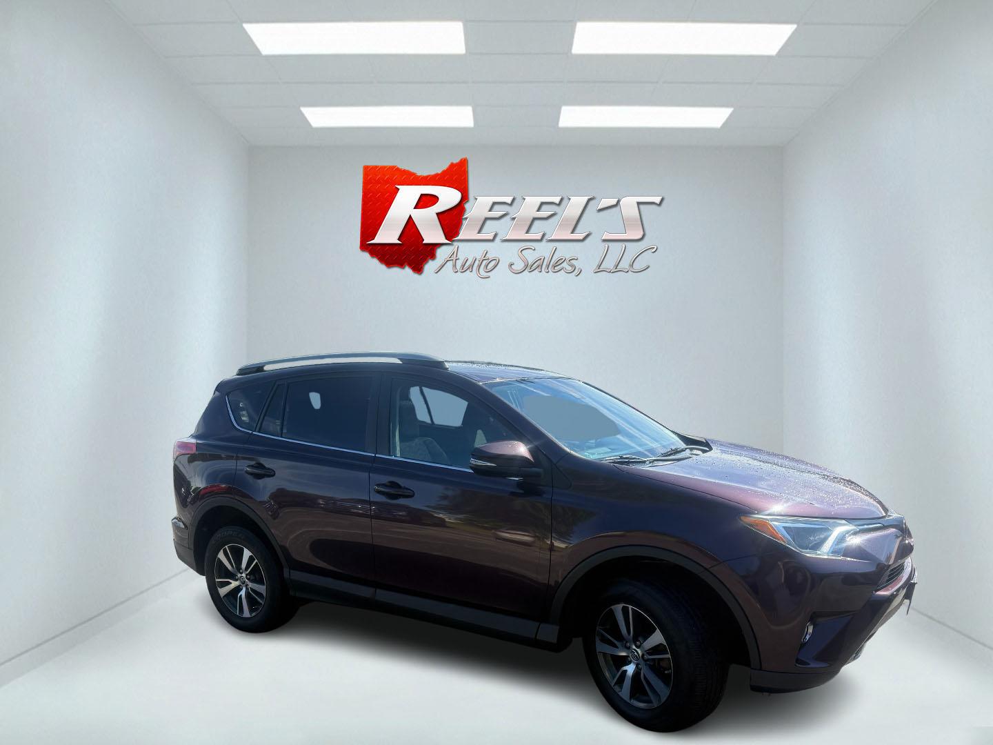 2018 Purple /Black Toyota RAV4 XLE AWD (2T3RFREV6JW) with an 2.5L I4 DOHC 16V engine, Automatic transmission, located at 547 E. Main St., Orwell, OH, 44076, (440) 437-5893, 41.535435, -80.847855 - 2018 Toyota RAV4 XLE AWD – Reliable, Efficient, and Loaded with Safety and Convenience! This clean 2018 Toyota RAV4 XLE AWD is a smart, well-rounded compact SUV that offers excellent reliability, strong value, and everyday practicality. Powered by a smooth 2.5L I4 engine paired with a responsive - Photo#3