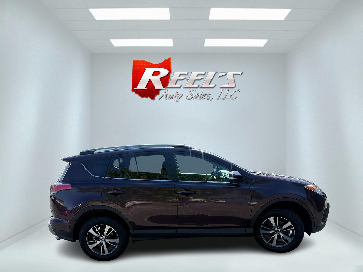2018 Purple /Black Toyota RAV4 XLE AWD (2T3RFREV6JW) with an 2.5L I4 DOHC 16V engine, Automatic transmission, located at 547 E. Main St., Orwell, OH, 44076, (440) 437-5893, 41.535435, -80.847855 - 2018 Toyota RAV4 XLE AWD – Reliable, Efficient, and Loaded with Safety and Convenience! This clean 2018 Toyota RAV4 XLE AWD is a smart, well-rounded compact SUV that offers excellent reliability, strong value, and everyday practicality. Powered by a smooth 2.5L I4 engine paired with a responsive - Photo#21