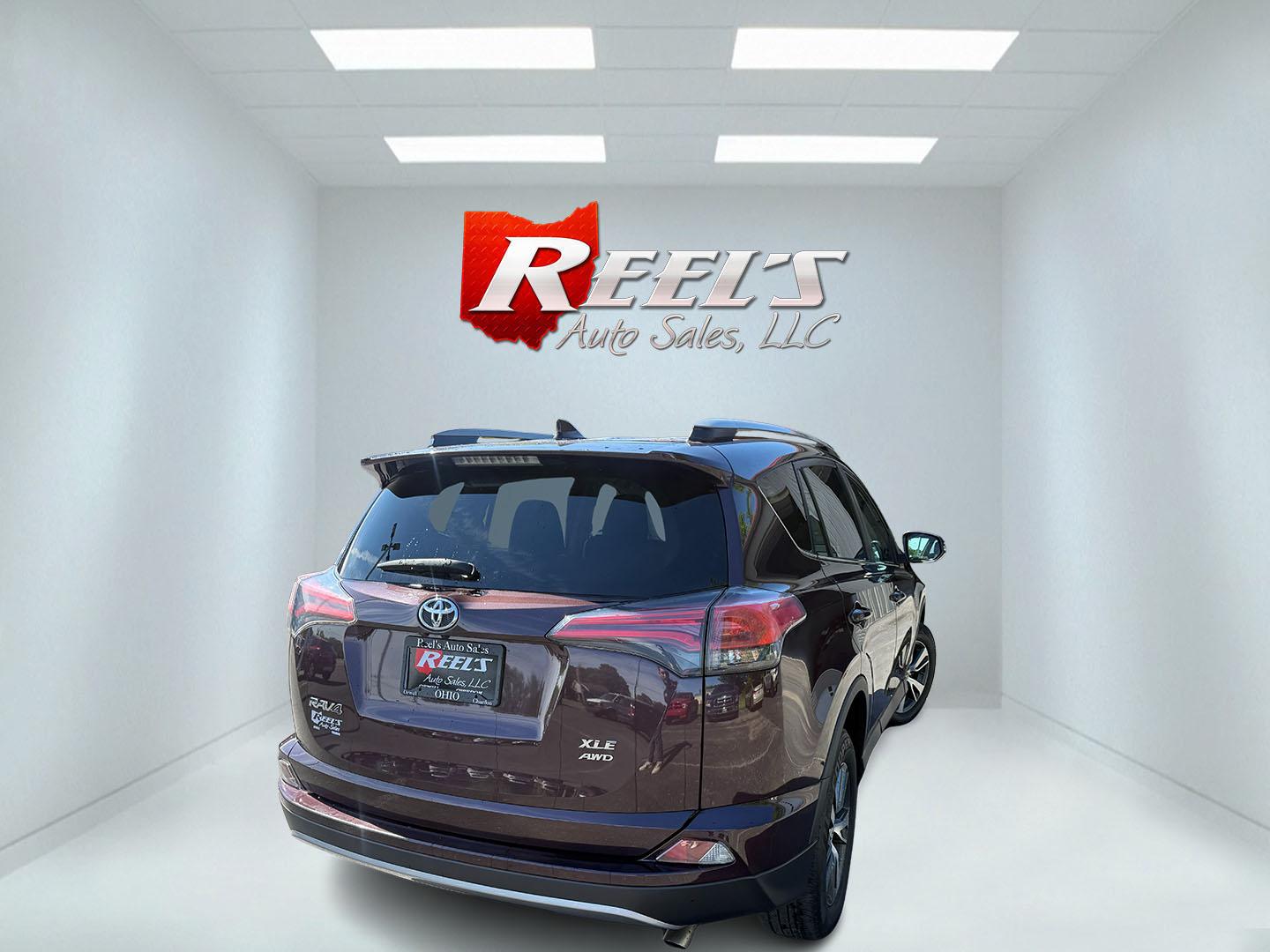 2018 Purple /Black Toyota RAV4 XLE AWD (2T3RFREV6JW) with an 2.5L I4 DOHC 16V engine, Automatic transmission, located at 547 E. Main St., Orwell, OH, 44076, (440) 437-5893, 41.535435, -80.847855 - 2018 Toyota RAV4 XLE AWD – Reliable, Efficient, and Loaded with Safety and Convenience! This clean 2018 Toyota RAV4 XLE AWD is a smart, well-rounded compact SUV that offers excellent reliability, strong value, and everyday practicality. Powered by a smooth 2.5L I4 engine paired with a responsive - Photo#23
