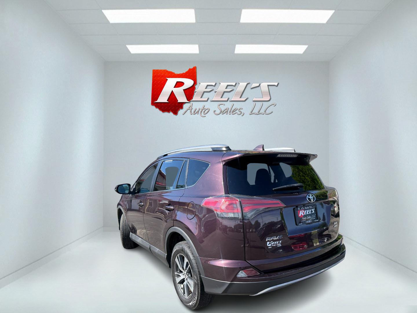 2018 Purple /Black Toyota RAV4 XLE AWD (2T3RFREV6JW) with an 2.5L I4 DOHC 16V engine, Automatic transmission, located at 547 E. Main St., Orwell, OH, 44076, (440) 437-5893, 41.535435, -80.847855 - 2018 Toyota RAV4 XLE AWD – Reliable, Efficient, and Loaded with Safety and Convenience! This clean 2018 Toyota RAV4 XLE AWD is a smart, well-rounded compact SUV that offers excellent reliability, strong value, and everyday practicality. Powered by a smooth 2.5L I4 engine paired with a responsive - Photo#25