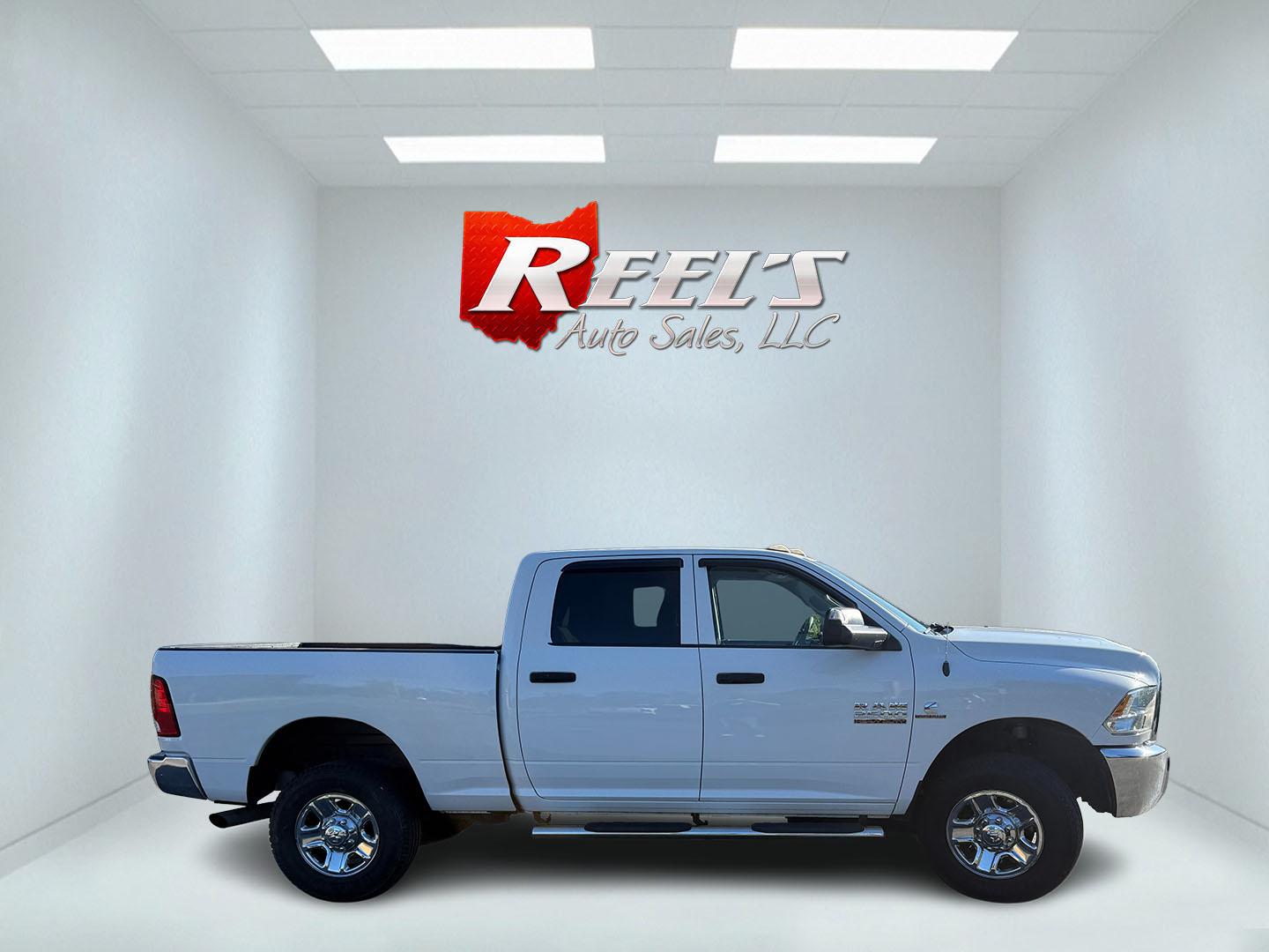 2017 White /Black RAM 2500 Tradesman Crew Cab SWB 4WD (3C6UR5CL3HG) with an 6.7L I6 OHV 24V TURBO DIESEL engine, Automatic transmission, located at 11115 Chardon Rd. , Chardon, OH, 44024, (440) 214-9705, 41.580246, -81.241943 - 2017 Ram 2500 Tradesman Crew Cab 4WD Cummins – Heavy-Duty Diesel Power with Snow Chief Package and Massive Towing Capacity! This 2017 Ram 2500 Tradesman Crew Cab 4WD is a serious work truck built for tough jobs and harsh winters. Powered by the legendary 6.7L Cummins I6 Turbo Diesel engine paired - Photo#8