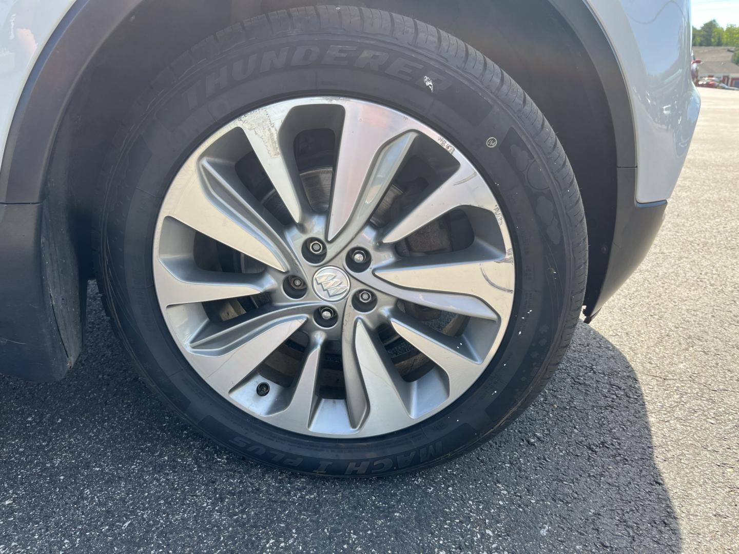 2017 White /Black Buick Encore Preferred FWD (KL4CJASB1HB) with an 1.4L I4 DOHC 16V TURBO engine, Automatic transmission, located at 547 E. Main St., Orwell, OH, 44076, (440) 437-5893, 41.535435, -80.847855 - 2017 Buick Encore Preferred FWD – Efficient Turbo Luxury in Summit White! This sharp 2017 Buick Encore Preferred FWD is a premium compact crossover that offers upscale comfort and excellent fuel efficiency. Powered by a peppy 1.4L Turbocharged EcoTec I4 engine paired with a smooth 6-speed automat - Photo#4