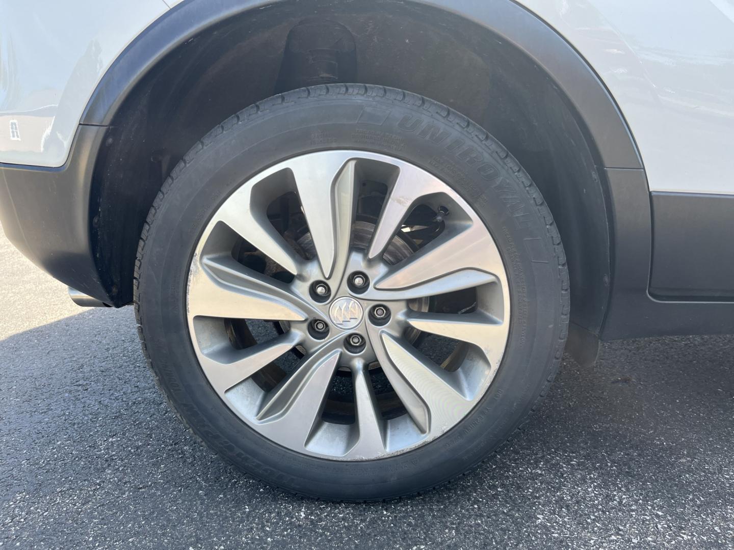2017 White /Black Buick Encore Preferred FWD (KL4CJASB1HB) with an 1.4L I4 DOHC 16V TURBO engine, Automatic transmission, located at 547 E. Main St., Orwell, OH, 44076, (440) 437-5893, 41.535435, -80.847855 - 2017 Buick Encore Preferred FWD – Efficient Turbo Luxury in Summit White! This sharp 2017 Buick Encore Preferred FWD is a premium compact crossover that offers upscale comfort and excellent fuel efficiency. Powered by a peppy 1.4L Turbocharged EcoTec I4 engine paired with a smooth 6-speed automat - Photo#6