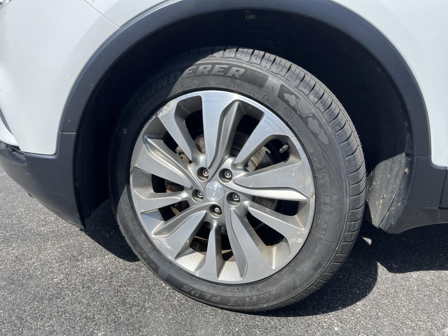 2017 White /Black Buick Encore Preferred FWD (KL4CJASB1HB) with an 1.4L I4 DOHC 16V TURBO engine, Automatic transmission, located at 547 E. Main St., Orwell, OH, 44076, (440) 437-5893, 41.535435, -80.847855 - 2017 Buick Encore Preferred FWD – Efficient Turbo Luxury in Summit White! This sharp 2017 Buick Encore Preferred FWD is a premium compact crossover that offers upscale comfort and excellent fuel efficiency. Powered by a peppy 1.4L Turbocharged EcoTec I4 engine paired with a smooth 6-speed automat - Photo#12