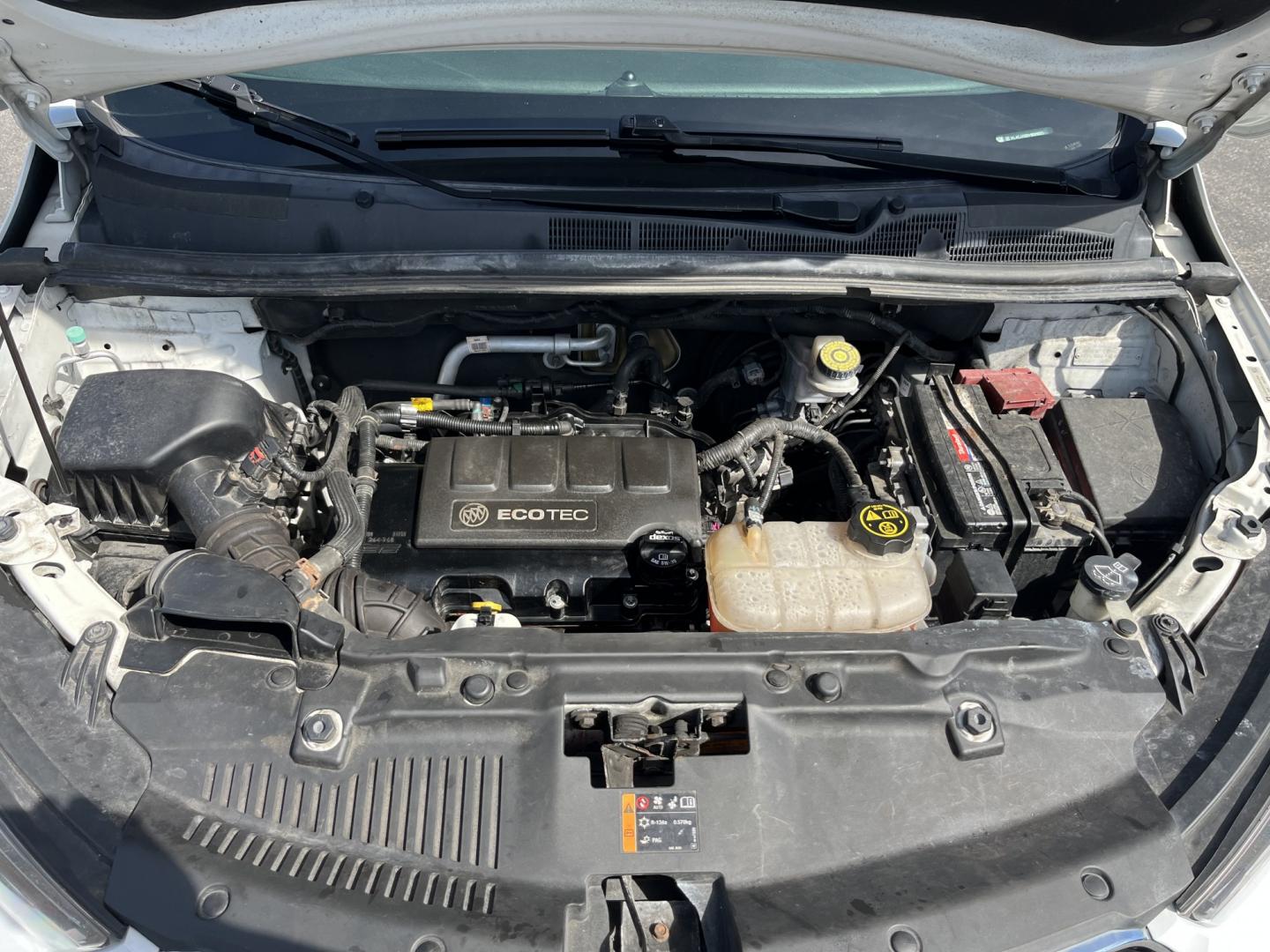 2017 White /Black Buick Encore Preferred FWD (KL4CJASB1HB) with an 1.4L I4 DOHC 16V TURBO engine, Automatic transmission, located at 547 E. Main St., Orwell, OH, 44076, (440) 437-5893, 41.535435, -80.847855 - 2017 Buick Encore Preferred FWD – Efficient Turbo Luxury in Summit White! This sharp 2017 Buick Encore Preferred FWD is a premium compact crossover that offers upscale comfort and excellent fuel efficiency. Powered by a peppy 1.4L Turbocharged EcoTec I4 engine paired with a smooth 6-speed automat - Photo#13