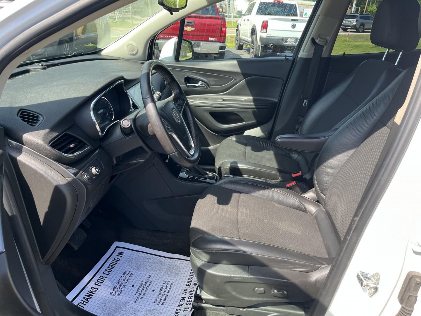 2017 White /Black Buick Encore Preferred FWD (KL4CJASB1HB) with an 1.4L I4 DOHC 16V TURBO engine, Automatic transmission, located at 547 E. Main St., Orwell, OH, 44076, (440) 437-5893, 41.535435, -80.847855 - 2017 Buick Encore Preferred FWD – Efficient Turbo Luxury in Summit White! This sharp 2017 Buick Encore Preferred FWD is a premium compact crossover that offers upscale comfort and excellent fuel efficiency. Powered by a peppy 1.4L Turbocharged EcoTec I4 engine paired with a smooth 6-speed automat - Photo#17