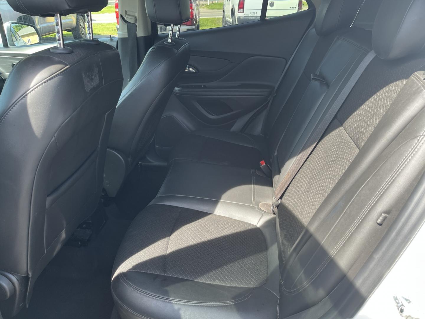 2017 White /Black Buick Encore Preferred FWD (KL4CJASB1HB) with an 1.4L I4 DOHC 16V TURBO engine, Automatic transmission, located at 547 E. Main St., Orwell, OH, 44076, (440) 437-5893, 41.535435, -80.847855 - 2017 Buick Encore Preferred FWD – Efficient Turbo Luxury in Summit White! This sharp 2017 Buick Encore Preferred FWD is a premium compact crossover that offers upscale comfort and excellent fuel efficiency. Powered by a peppy 1.4L Turbocharged EcoTec I4 engine paired with a smooth 6-speed automat - Photo#29