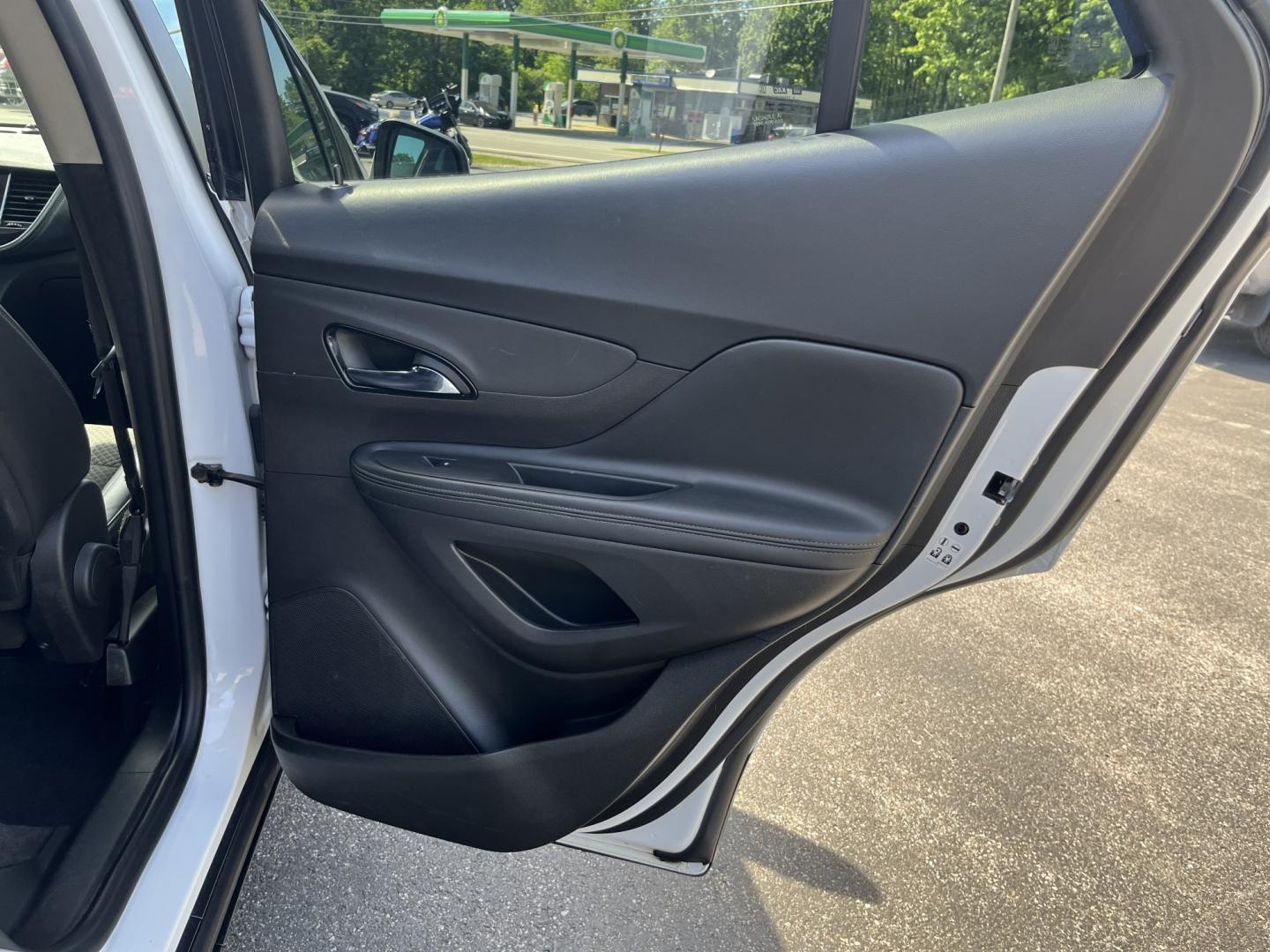2017 White /Black Buick Encore Preferred FWD (KL4CJASB1HB) with an 1.4L I4 DOHC 16V TURBO engine, Automatic transmission, located at 547 E. Main St., Orwell, OH, 44076, (440) 437-5893, 41.535435, -80.847855 - 2017 Buick Encore Preferred FWD – Efficient Turbo Luxury in Summit White! This sharp 2017 Buick Encore Preferred FWD is a premium compact crossover that offers upscale comfort and excellent fuel efficiency. Powered by a peppy 1.4L Turbocharged EcoTec I4 engine paired with a smooth 6-speed automat - Photo#31
