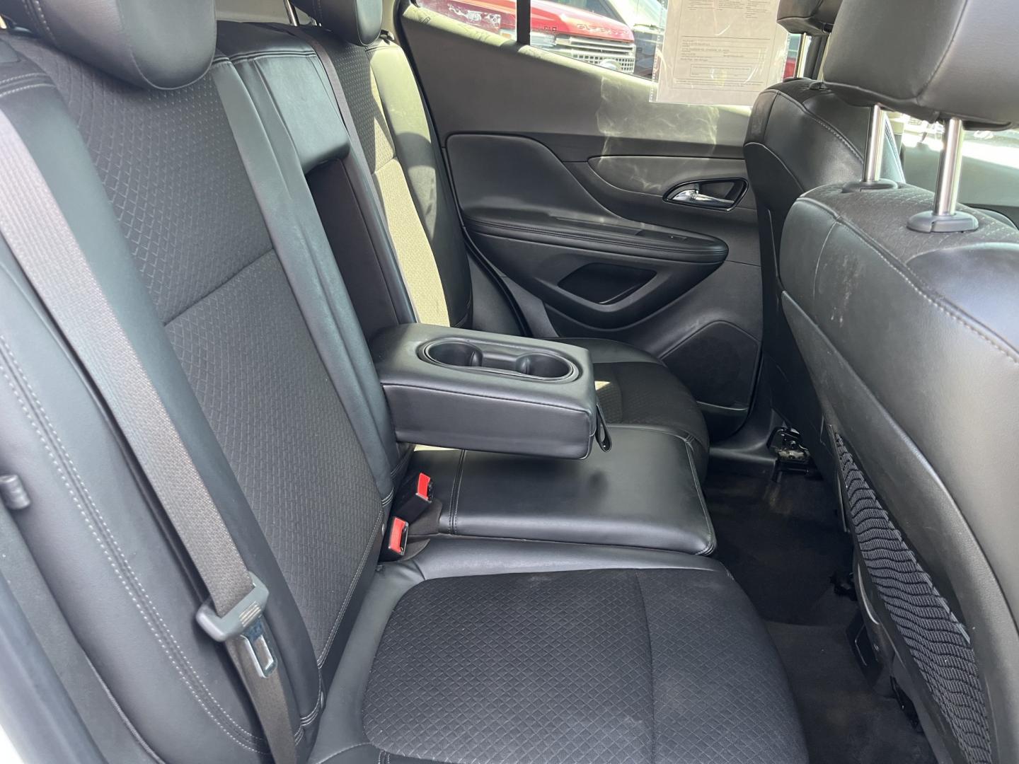 2017 White /Black Buick Encore Preferred FWD (KL4CJASB1HB) with an 1.4L I4 DOHC 16V TURBO engine, Automatic transmission, located at 547 E. Main St., Orwell, OH, 44076, (440) 437-5893, 41.535435, -80.847855 - 2017 Buick Encore Preferred FWD – Efficient Turbo Luxury in Summit White! This sharp 2017 Buick Encore Preferred FWD is a premium compact crossover that offers upscale comfort and excellent fuel efficiency. Powered by a peppy 1.4L Turbocharged EcoTec I4 engine paired with a smooth 6-speed automat - Photo#32