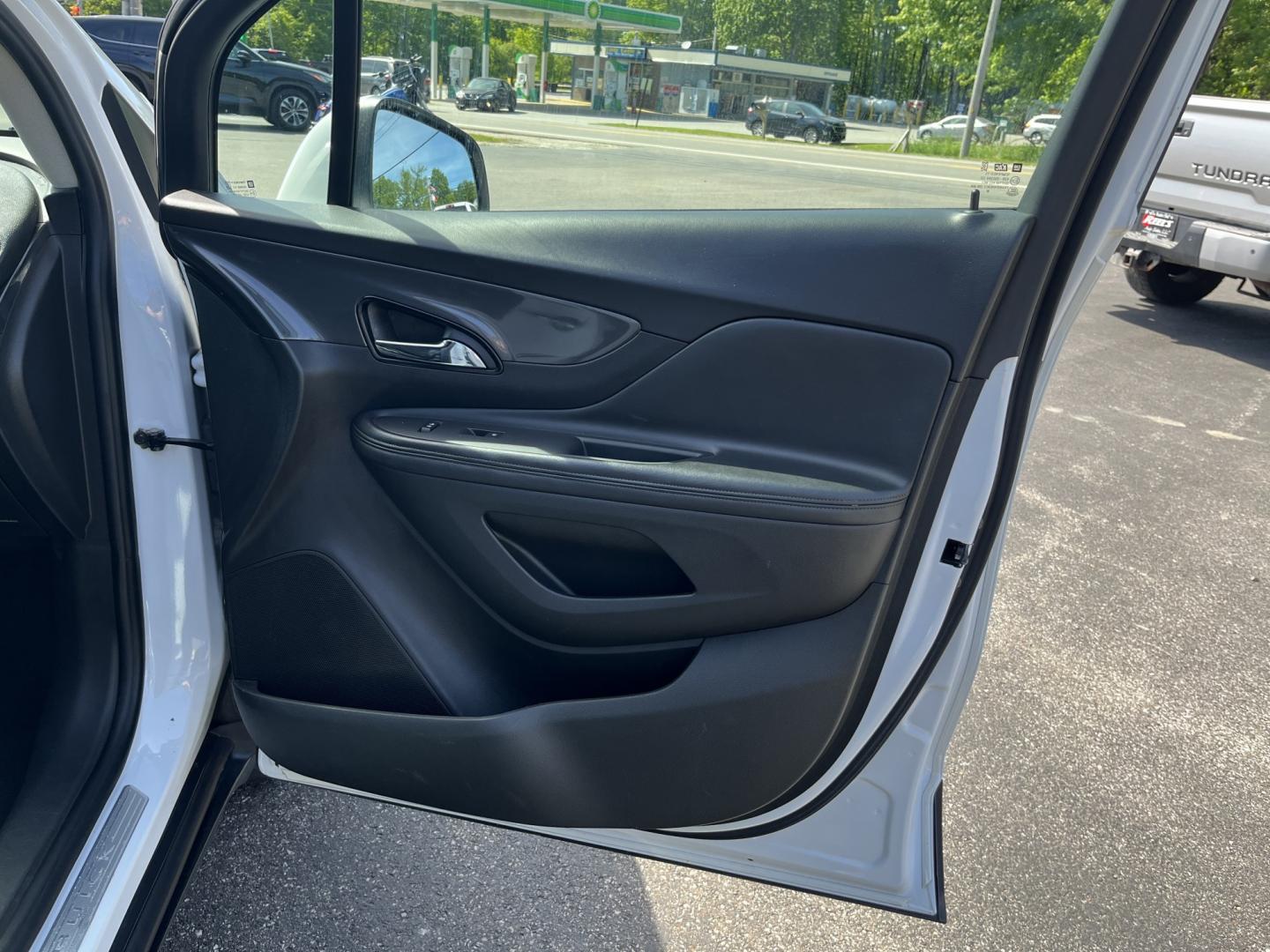 2017 White /Black Buick Encore Preferred FWD (KL4CJASB1HB) with an 1.4L I4 DOHC 16V TURBO engine, Automatic transmission, located at 547 E. Main St., Orwell, OH, 44076, (440) 437-5893, 41.535435, -80.847855 - 2017 Buick Encore Preferred FWD – Efficient Turbo Luxury in Summit White! This sharp 2017 Buick Encore Preferred FWD is a premium compact crossover that offers upscale comfort and excellent fuel efficiency. Powered by a peppy 1.4L Turbocharged EcoTec I4 engine paired with a smooth 6-speed automat - Photo#33
