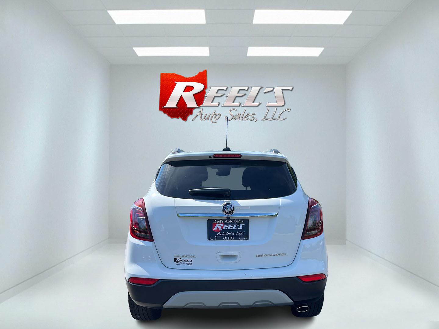2017 White /Black Buick Encore Preferred FWD (KL4CJASB1HB) with an 1.4L I4 DOHC 16V TURBO engine, Automatic transmission, located at 547 E. Main St., Orwell, OH, 44076, (440) 437-5893, 41.535435, -80.847855 - 2017 Buick Encore Preferred FWD – Efficient Turbo Luxury in Summit White! This sharp 2017 Buick Encore Preferred FWD is a premium compact crossover that offers upscale comfort and excellent fuel efficiency. Powered by a peppy 1.4L Turbocharged EcoTec I4 engine paired with a smooth 6-speed automat - Photo#8