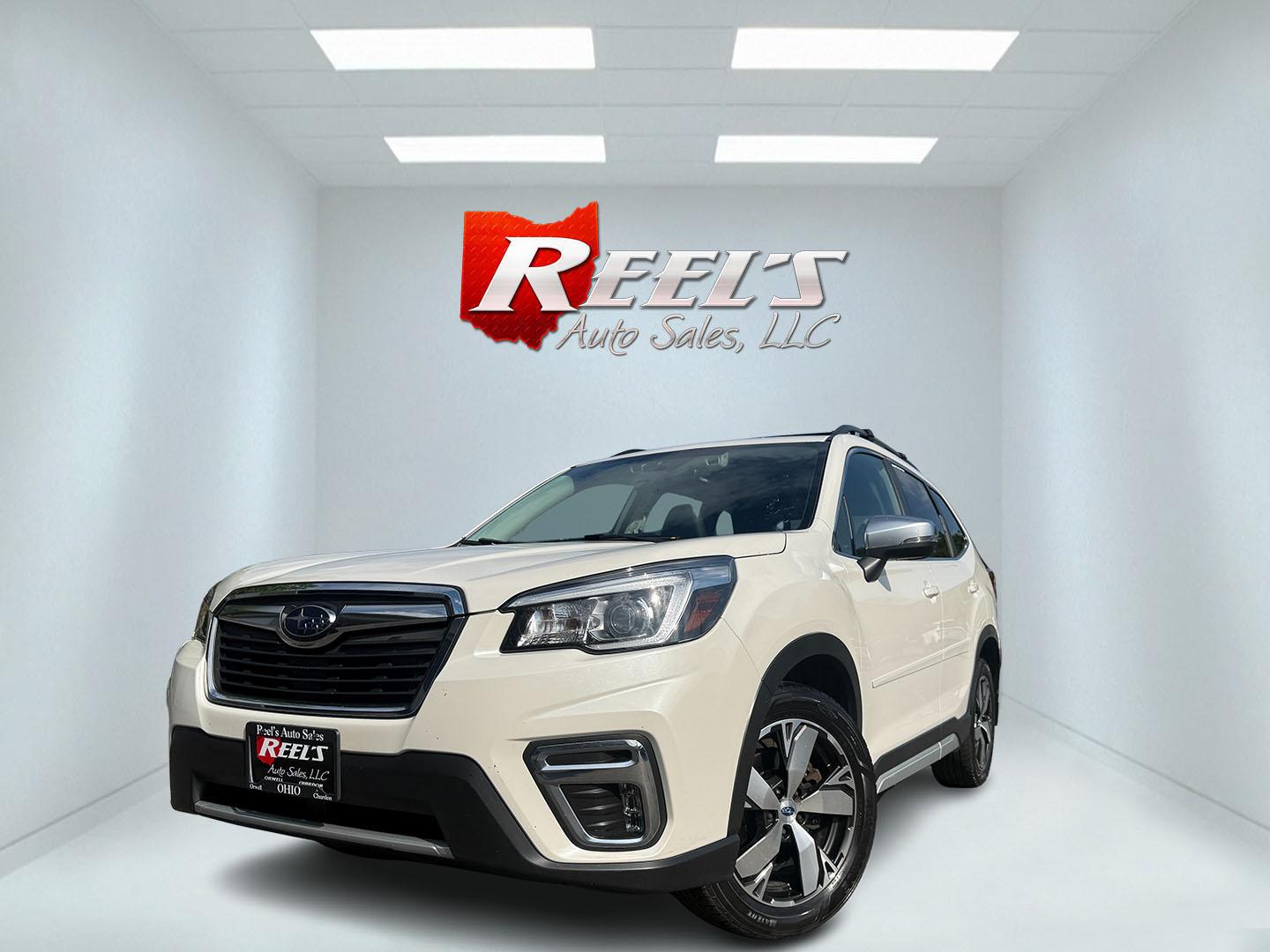 2020 White /Black Subaru Forester Touring (JF2SKAXCXLH) with an 2.5L H4 DOHC 16V engine, Automatic transmission, located at 547 E. Main St., Orwell, OH, 44076, (440) 437-5893, 41.535435, -80.847855 - 2020 Subaru Forester Touring AWD – Premium Compact SUV with Leather, Harman Kardon Sound, and Outstanding Capability! This 2020 Subaru Forester Touring AWD is a top-trim model that delivers luxury comfort, advanced safety, and legendary all-weather performance. Powered by Subaru’s reliable 2.5L- Photo#0
