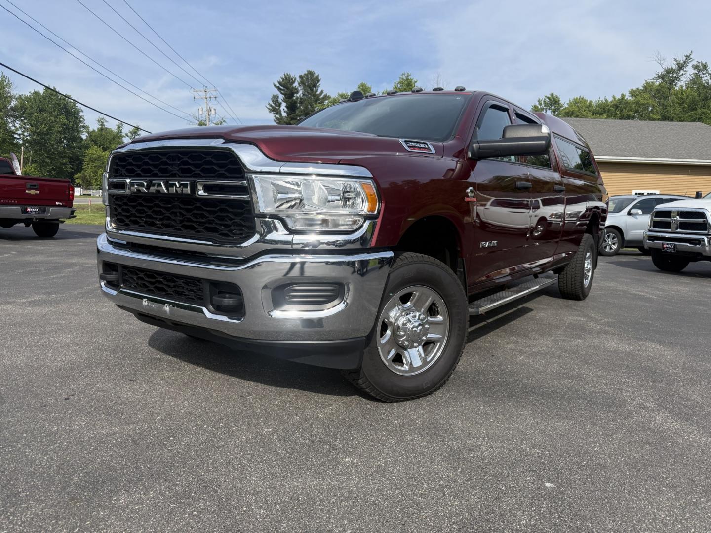 2022 Red /Black RAM 2500 Tradesman Crew Cab LWB 4WD (3C6UR5HL3NG) with an 6.7L I6 OHV 24V TURBO DIESEL engine, Automatic transmission, located at 547 E. Main St., Orwell, OH, 44076, (440) 437-5893, 41.535435, -80.847855 - 2022 Ram 2500 Tradesman Crew Cab Long Bed 4WD – Heavy-Duty Cummins Diesel with Massive Towing Power! This 2022 Ram 2500 Tradesman Crew Cab Long Bed 4WD is a no-nonsense, work-ready heavy-duty truck built for the toughest jobs. Powered by the legendary 6.7L Turbocharged Cummins I6 Diesel engine pa - Photo#0
