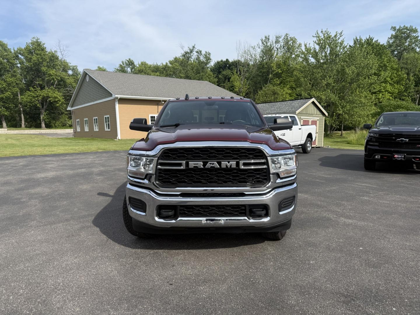 2022 Red /Black RAM 2500 Tradesman Crew Cab LWB 4WD (3C6UR5HL3NG) with an 6.7L I6 OHV 24V TURBO DIESEL engine, Automatic transmission, located at 547 E. Main St., Orwell, OH, 44076, (440) 437-5893, 41.535435, -80.847855 - 2022 Ram 2500 Tradesman Crew Cab Long Bed 4WD – Heavy-Duty Cummins Diesel with Massive Towing Power! This 2022 Ram 2500 Tradesman Crew Cab Long Bed 4WD is a no-nonsense, work-ready heavy-duty truck built for the toughest jobs. Powered by the legendary 6.7L Turbocharged Cummins I6 Diesel engine pa - Photo#1