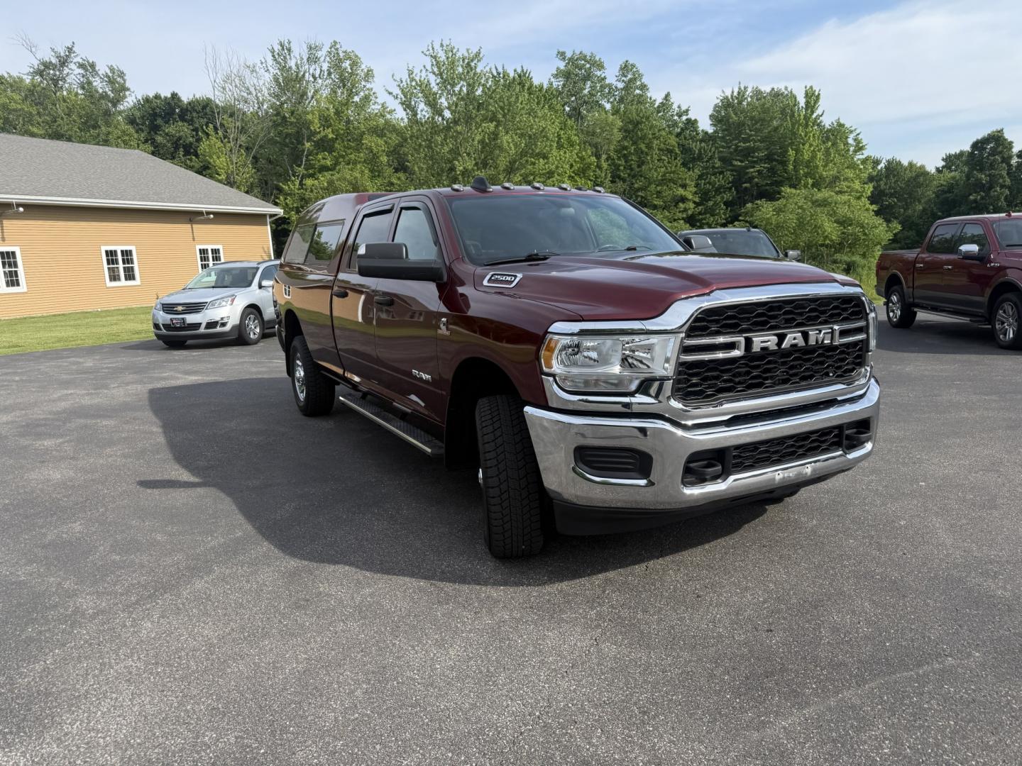 2022 Red /Black RAM 2500 Tradesman Crew Cab LWB 4WD (3C6UR5HL3NG) with an 6.7L I6 OHV 24V TURBO DIESEL engine, Automatic transmission, located at 547 E. Main St., Orwell, OH, 44076, (440) 437-5893, 41.535435, -80.847855 - 2022 Ram 2500 Tradesman Crew Cab Long Bed 4WD – Heavy-Duty Cummins Diesel with Massive Towing Power! This 2022 Ram 2500 Tradesman Crew Cab Long Bed 4WD is a no-nonsense, work-ready heavy-duty truck built for the toughest jobs. Powered by the legendary 6.7L Turbocharged Cummins I6 Diesel engine pa - Photo#2