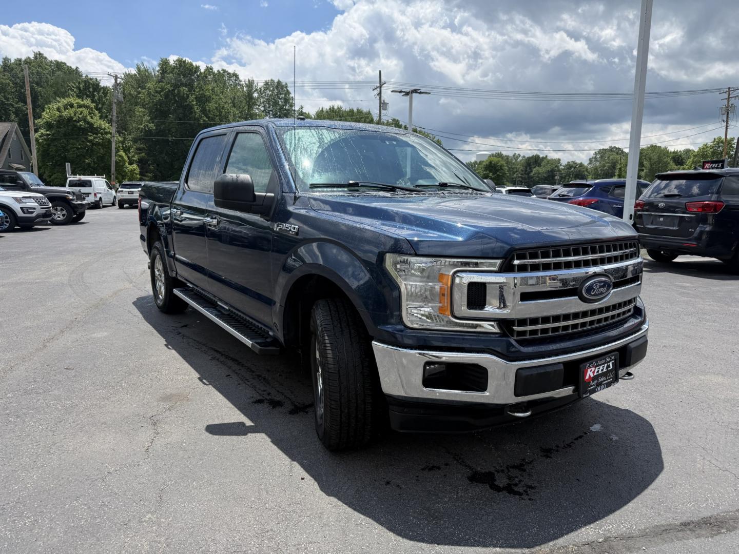 2018 Blue /Gray Ford F-150 XLT SuperCrew 5.5-ft. 4WD (1FTEW1E53JF) with an 5.0L V8 OHV 32V engine, Automatic transmission, located at 547 E. Main St., Orwell, OH, 44076, (440) 437-5893, 41.535435, -80.847855 - 2018 Ford F-150 XLT Crew Cab – Coyote V8 Power with Strong Towing and Extended-Range Fuel Tank! This clean 2018 Ford F-150 XLT Crew Cab is a capable and practical full-size truck that’s ready for work or weekend adventures. Powered by Ford’s legendary 5.0L Coyote V8 engine with flex fuel capa - Photo#2
