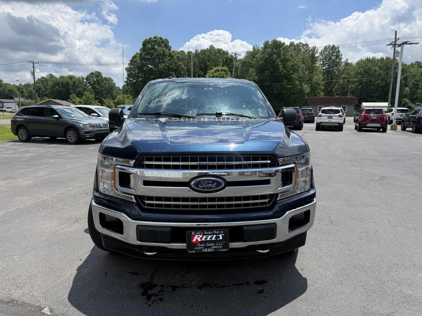 2018 Blue /Gray Ford F-150 XLT SuperCrew 5.5-ft. 4WD (1FTEW1E53JF) with an 5.0L V8 OHV 32V engine, Automatic transmission, located at 547 E. Main St., Orwell, OH, 44076, (440) 437-5893, 41.535435, -80.847855 - 2018 Ford F-150 XLT Crew Cab – Coyote V8 Power with Strong Towing and Extended-Range Fuel Tank! This clean 2018 Ford F-150 XLT Crew Cab is a capable and practical full-size truck that’s ready for work or weekend adventures. Powered by Ford’s legendary 5.0L Coyote V8 engine with flex fuel capa - Photo#1