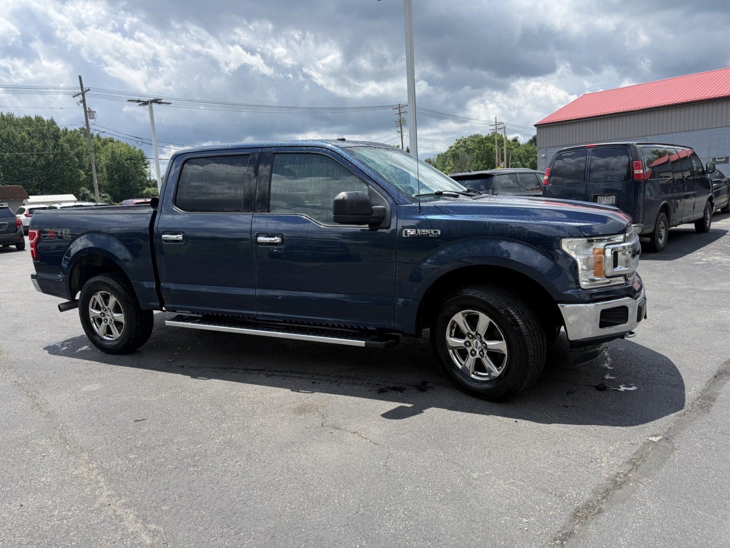 2018 Blue /Gray Ford F-150 XLT SuperCrew 5.5-ft. 4WD (1FTEW1E53JF) with an 5.0L V8 OHV 32V engine, Automatic transmission, located at 547 E. Main St., Orwell, OH, 44076, (440) 437-5893, 41.535435, -80.847855 - 2018 Ford F-150 XLT Crew Cab – Coyote V8 Power with Strong Towing and Extended-Range Fuel Tank! This clean 2018 Ford F-150 XLT Crew Cab is a capable and practical full-size truck that’s ready for work or weekend adventures. Powered by Ford’s legendary 5.0L Coyote V8 engine with flex fuel capa - Photo#3