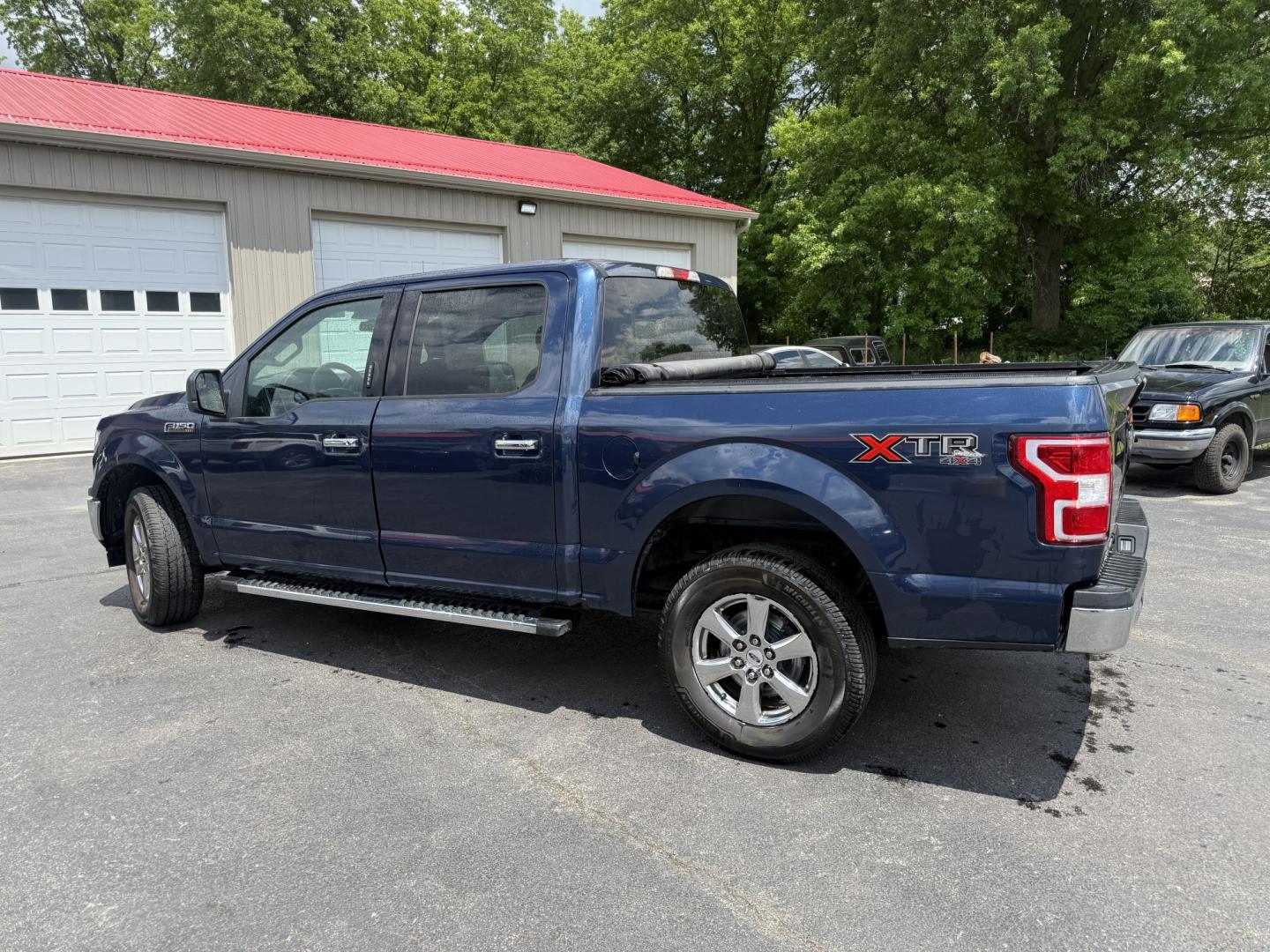 2018 Blue /Gray Ford F-150 XLT SuperCrew 5.5-ft. 4WD (1FTEW1E53JF) with an 5.0L V8 OHV 32V engine, Automatic transmission, located at 547 E. Main St., Orwell, OH, 44076, (440) 437-5893, 41.535435, -80.847855 - 2018 Ford F-150 XLT Crew Cab – Coyote V8 Power with Strong Towing and Extended-Range Fuel Tank! This clean 2018 Ford F-150 XLT Crew Cab is a capable and practical full-size truck that’s ready for work or weekend adventures. Powered by Ford’s legendary 5.0L Coyote V8 engine with flex fuel capa - Photo#29