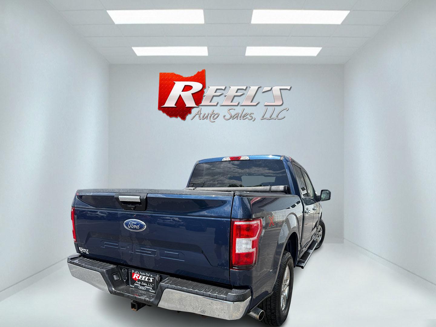 2018 Blue /Gray Ford F-150 XLT SuperCrew 5.5-ft. 4WD (1FTEW1E53JF) with an 5.0L V8 OHV 32V engine, Automatic transmission, located at 547 E. Main St., Orwell, OH, 44076, (440) 437-5893, 41.535435, -80.847855 - 2018 Ford F-150 XLT Crew Cab – Coyote V8 Power with Strong Towing and Extended-Range Fuel Tank! This clean 2018 Ford F-150 XLT Crew Cab is a capable and practical full-size truck that’s ready for work or weekend adventures. Powered by Ford’s legendary 5.0L Coyote V8 engine with flex fuel capa- Photo#26