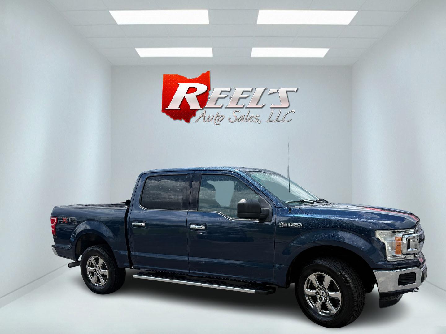 2018 Blue /Gray Ford F-150 XLT SuperCrew 5.5-ft. 4WD (1FTEW1E53JF) with an 5.0L V8 OHV 32V engine, Automatic transmission, located at 547 E. Main St., Orwell, OH, 44076, (440) 437-5893, 41.535435, -80.847855 - 2018 Ford F-150 XLT Crew Cab – Coyote V8 Power with Strong Towing and Extended-Range Fuel Tank! This clean 2018 Ford F-150 XLT Crew Cab is a capable and practical full-size truck that’s ready for work or weekend adventures. Powered by Ford’s legendary 5.0L Coyote V8 engine with flex fuel capa- Photo#3