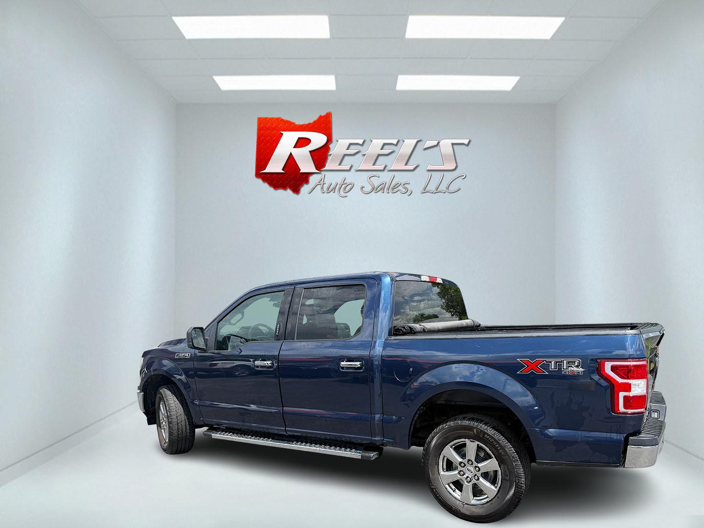 2018 Blue /Gray Ford F-150 XLT SuperCrew 5.5-ft. 4WD (1FTEW1E53JF) with an 5.0L V8 OHV 32V engine, Automatic transmission, located at 547 E. Main St., Orwell, OH, 44076, (440) 437-5893, 41.535435, -80.847855 - 2018 Ford F-150 XLT Crew Cab – Coyote V8 Power with Strong Towing and Extended-Range Fuel Tank! This clean 2018 Ford F-150 XLT Crew Cab is a capable and practical full-size truck that’s ready for work or weekend adventures. Powered by Ford’s legendary 5.0L Coyote V8 engine with flex fuel capa- Photo#29
