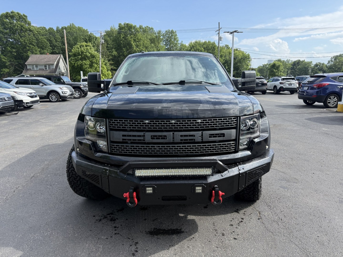 2011 Black /Black Ford F-150 SVT Raptor SuperCrew 5.5-ft. Bed 4WD (1FTFW1R6XBF) with an 6.2L V8 SOHC 16V engine, Automatic transmission, located at 547 E. Main St., Orwell, OH, 44076, (440) 437-5893, 41.535435, -80.847855 - 2011 Ford SVT Raptor Crew Cab 4WD – Iconic Off-Road Legend with 6.2L V8 Power! This 2011 Ford SVT Raptor Crew Cab 4WD is the original high-performance desert and trail truck that started the Raptor legacy. Powered by the massive 6.2L V8 engine paired with a smooth 6-speed automatic transmission, - Photo#1