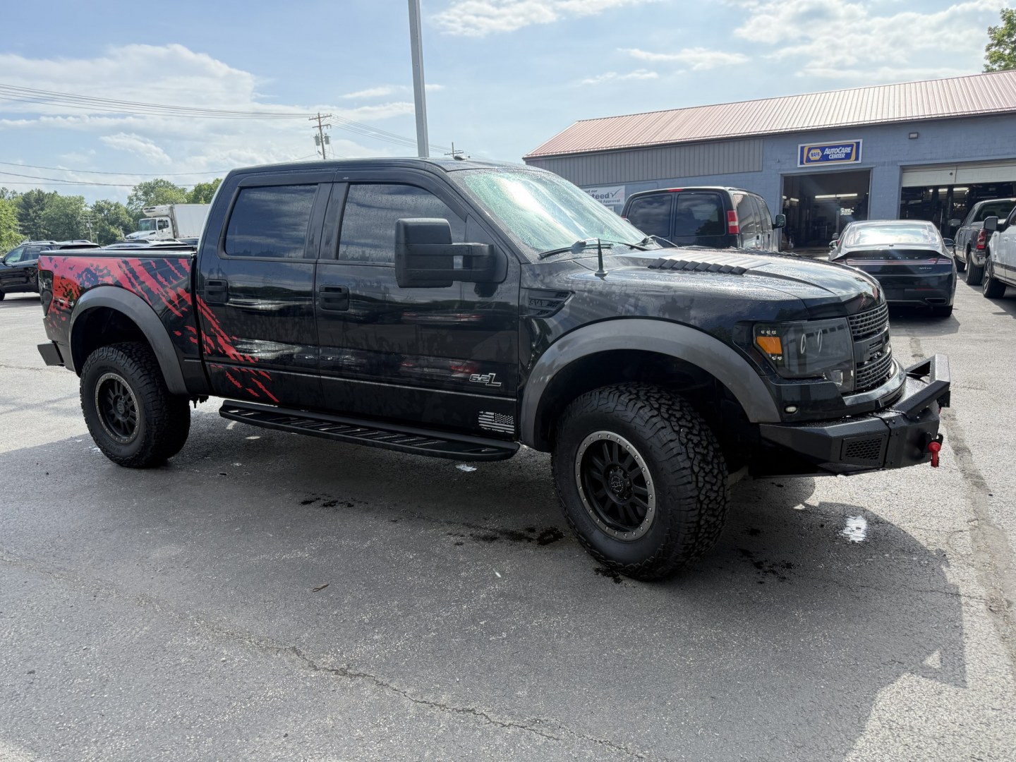 2011 Black /Black Ford F-150 SVT Raptor SuperCrew 5.5-ft. Bed 4WD (1FTFW1R6XBF) with an 6.2L V8 SOHC 16V engine, Automatic transmission, located at 547 E. Main St., Orwell, OH, 44076, (440) 437-5893, 41.535435, -80.847855 - 2011 Ford SVT Raptor Crew Cab 4WD – Iconic Off-Road Legend with 6.2L V8 Power! This 2011 Ford SVT Raptor Crew Cab 4WD is the original high-performance desert and trail truck that started the Raptor legacy. Powered by the massive 6.2L V8 engine paired with a smooth 6-speed automatic transmission, - Photo#3
