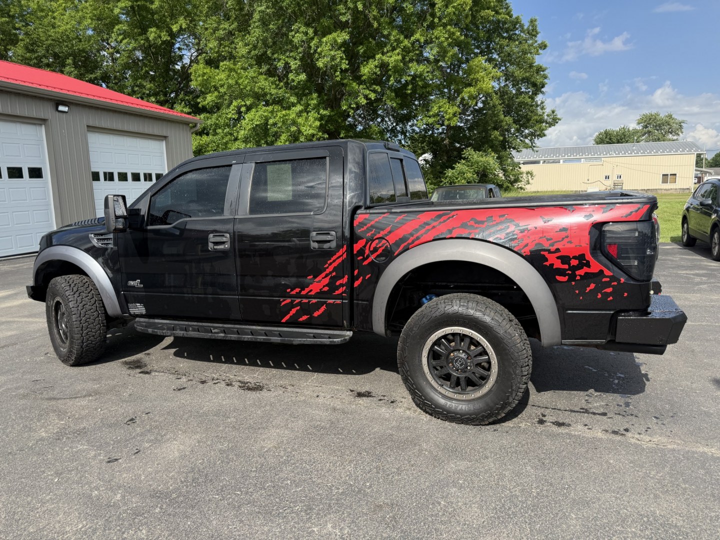 2011 Black /Black Ford F-150 SVT Raptor SuperCrew 5.5-ft. Bed 4WD (1FTFW1R6XBF) with an 6.2L V8 SOHC 16V engine, Automatic transmission, located at 547 E. Main St., Orwell, OH, 44076, (440) 437-5893, 41.535435, -80.847855 - 2011 Ford SVT Raptor Crew Cab 4WD – Iconic Off-Road Legend with 6.2L V8 Power! This 2011 Ford SVT Raptor Crew Cab 4WD is the original high-performance desert and trail truck that started the Raptor legacy. Powered by the massive 6.2L V8 engine paired with a smooth 6-speed automatic transmission, - Photo#30