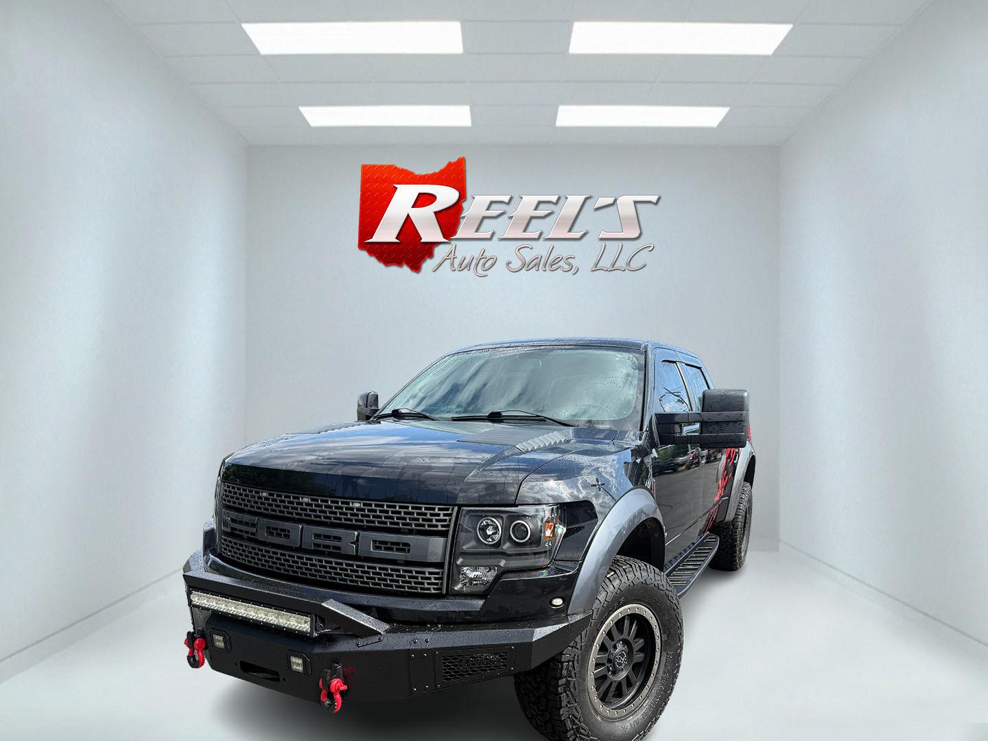 2011 Black /Black Ford F-150 SVT Raptor SuperCrew 5.5-ft. Bed 4WD (1FTFW1R6XBF) with an 6.2L V8 SOHC 16V engine, Automatic transmission, located at 11115 Chardon Rd. , Chardon, OH, 44024, (440) 214-9705, 41.580246, -81.241943 - 2011 Ford SVT Raptor Crew Cab 4WD – Iconic Off-Road Legend with 6.2L V8 Power! This 2011 Ford SVT Raptor Crew Cab 4WD is the original high-performance desert and trail truck that started the Raptor legacy. Powered by the massive 6.2L V8 engine paired with a smooth 6-speed automatic transmission,- Photo#0
