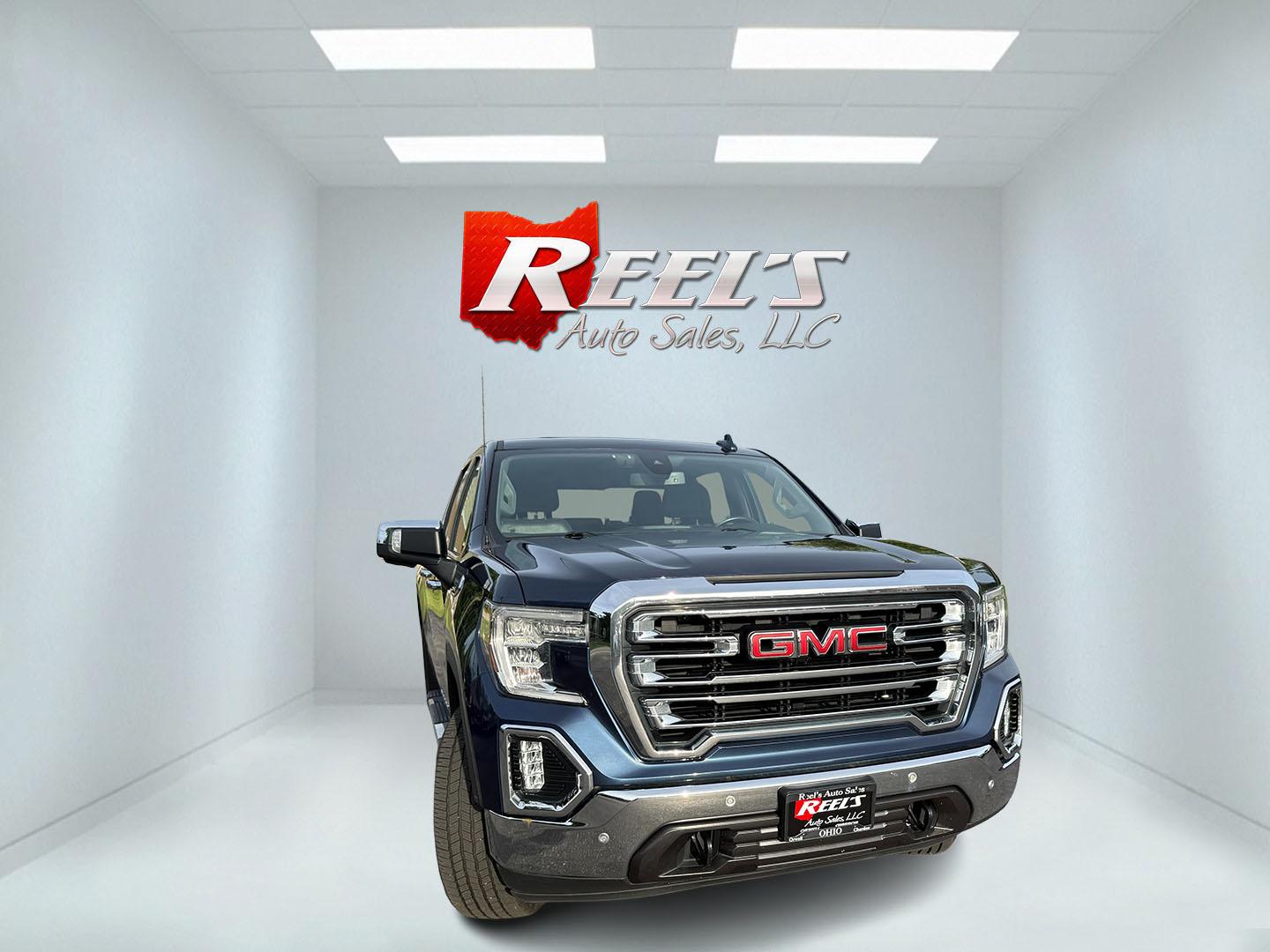 2020 Blue /Black GMC Sierra 1500 SLT Crew Cab Short Box 4WD (3GTU9DED0LG) with an 5.3L V8 OHV 16V engine, Automatic transmission, located at 547 E. Main St., Orwell, OH, 44076, (440) 437-5893, 41.535435, -80.847855 - 2020 GMC Sierra 1500 SLT Crew Cab 4WD – Texas Edition with X31 Off-Road Package and Loaded Luxury Features! This sharp 2020 GMC Sierra 1500 SLT Crew Cab 4WD is a premium, well-equipped truck that combines strong performance, off-road capability, and upscale comfort. Powered by a reliable 5.3L Eco- Photo#1