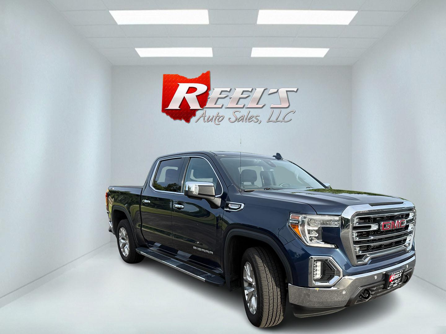 2020 Blue /Black GMC Sierra 1500 SLT Crew Cab Short Box 4WD (3GTU9DED0LG) with an 5.3L V8 OHV 16V engine, Automatic transmission, located at 547 E. Main St., Orwell, OH, 44076, (440) 437-5893, 41.535435, -80.847855 - 2020 GMC Sierra 1500 SLT Crew Cab 4WD – Texas Edition with X31 Off-Road Package and Loaded Luxury Features! This sharp 2020 GMC Sierra 1500 SLT Crew Cab 4WD is a premium, well-equipped truck that combines strong performance, off-road capability, and upscale comfort. Powered by a reliable 5.3L Eco- Photo#2