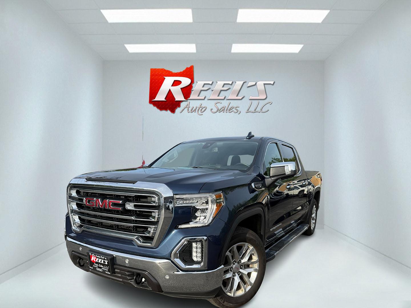 2020 Blue /Black GMC Sierra 1500 SLT Crew Cab Short Box 4WD (3GTU9DED0LG) with an 5.3L V8 OHV 16V engine, Automatic transmission, located at 547 E. Main St., Orwell, OH, 44076, (440) 437-5893, 41.535435, -80.847855 - 2020 GMC Sierra 1500 SLT Crew Cab 4WD – Texas Edition with X31 Off-Road Package and Loaded Luxury Features! This sharp 2020 GMC Sierra 1500 SLT Crew Cab 4WD is a premium, well-equipped truck that combines strong performance, off-road capability, and upscale comfort. Powered by a reliable 5.3L Eco- Photo#0