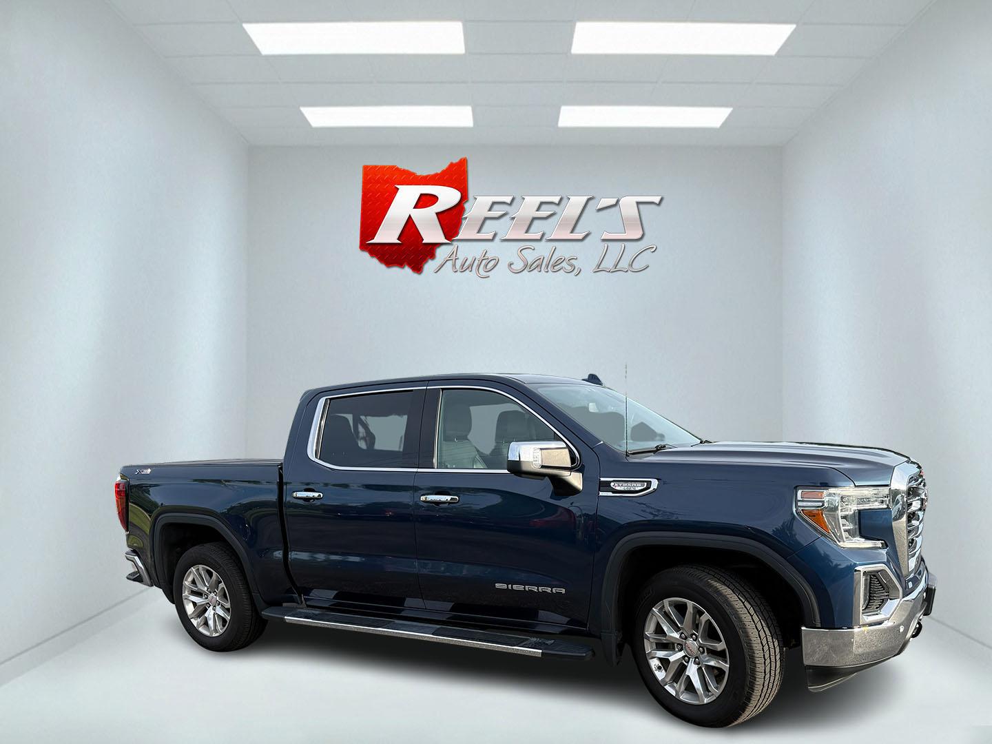 2020 Blue /Black GMC Sierra 1500 SLT Crew Cab Short Box 4WD (3GTU9DED0LG) with an 5.3L V8 OHV 16V engine, Automatic transmission, located at 547 E. Main St., Orwell, OH, 44076, (440) 437-5893, 41.535435, -80.847855 - 2020 GMC Sierra 1500 SLT Crew Cab 4WD – Texas Edition with X31 Off-Road Package and Loaded Luxury Features! This sharp 2020 GMC Sierra 1500 SLT Crew Cab 4WD is a premium, well-equipped truck that combines strong performance, off-road capability, and upscale comfort. Powered by a reliable 5.3L Eco- Photo#3