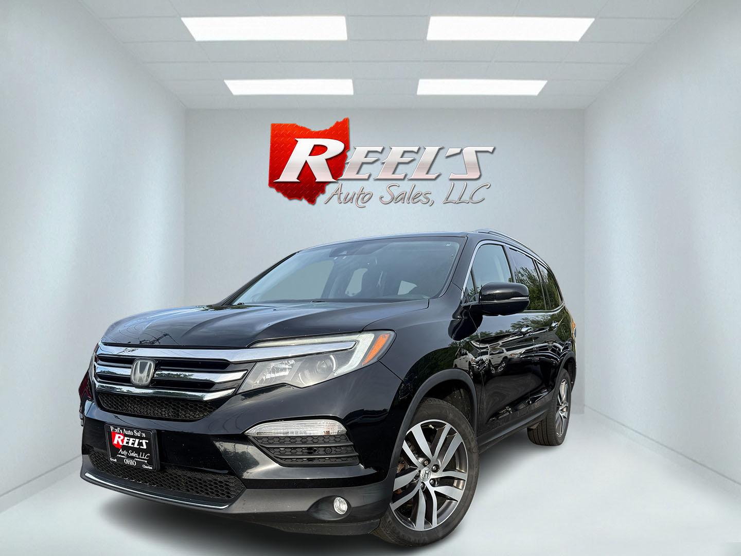 2018 Black /Black Honda Pilot Touring 4WD (5FNYF6H92JB) with an 3.5L V6 SOHC 24V engine, Automatic transmission, located at 547 E. Main St., Orwell, OH, 44076, (440) 437-5893, 41.535435, -80.847855 - 2018 Honda Pilot Touring AWD – Premium 3-Row Family SUV with Leather, Strong V6 Power, and Advanced Safety! This 2018 Honda Pilot Touring AWD is a loaded, upscale 3-row SUV that delivers the perfect combination of comfort, capability, and modern technology. Powered by Honda’s smooth 3.5L Earth- Photo#0