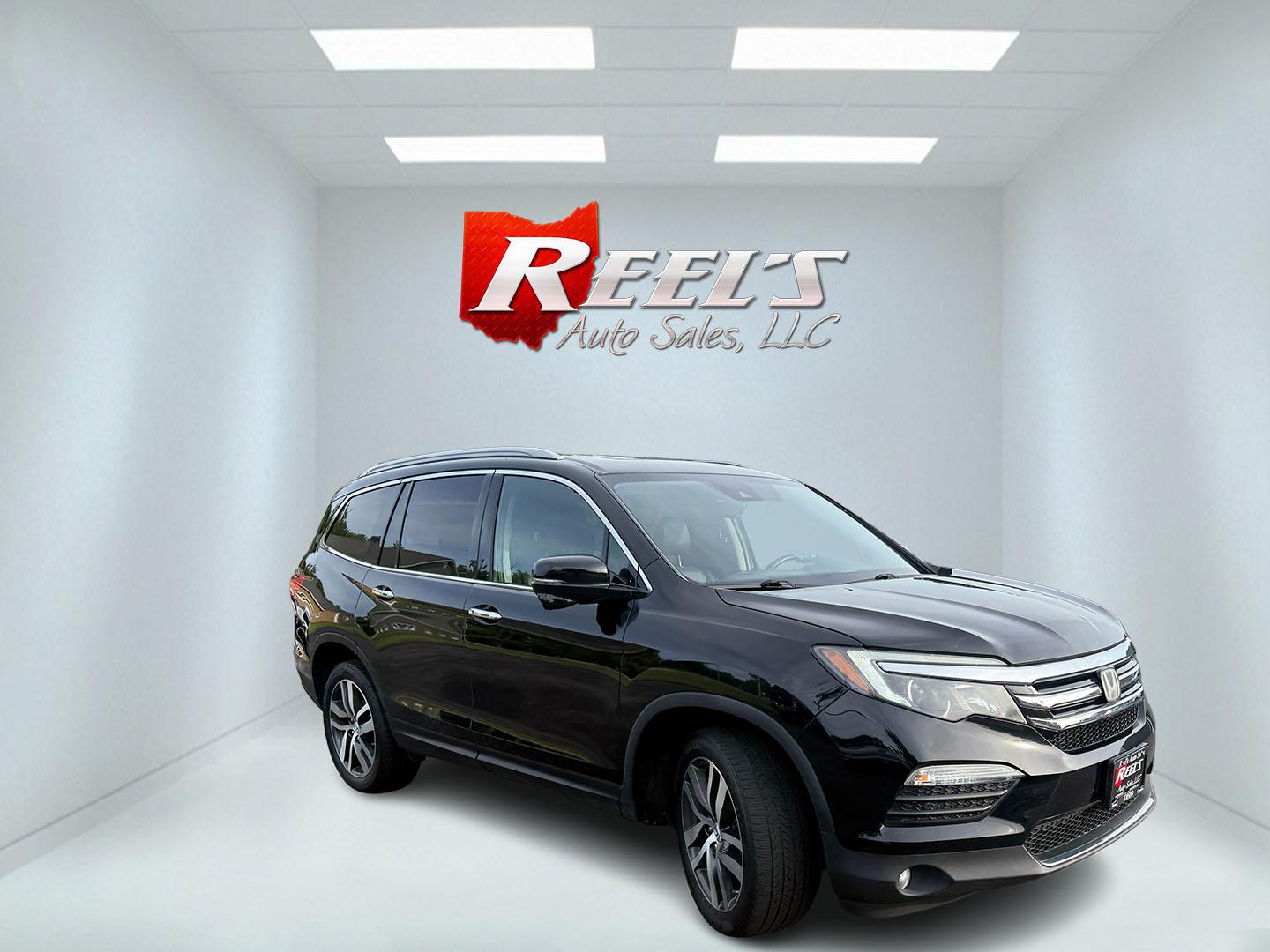 2018 Black /Black Honda Pilot Touring 4WD (5FNYF6H92JB) with an 3.5L V6 SOHC 24V engine, Automatic transmission, located at 547 E. Main St., Orwell, OH, 44076, (440) 437-5893, 41.535435, -80.847855 - 2018 Honda Pilot Touring AWD – Premium 3-Row Family SUV with Leather, Strong V6 Power, and Advanced Safety! This 2018 Honda Pilot Touring AWD is a loaded, upscale 3-row SUV that delivers the perfect combination of comfort, capability, and modern technology. Powered by Honda’s smooth 3.5L Earth- Photo#2