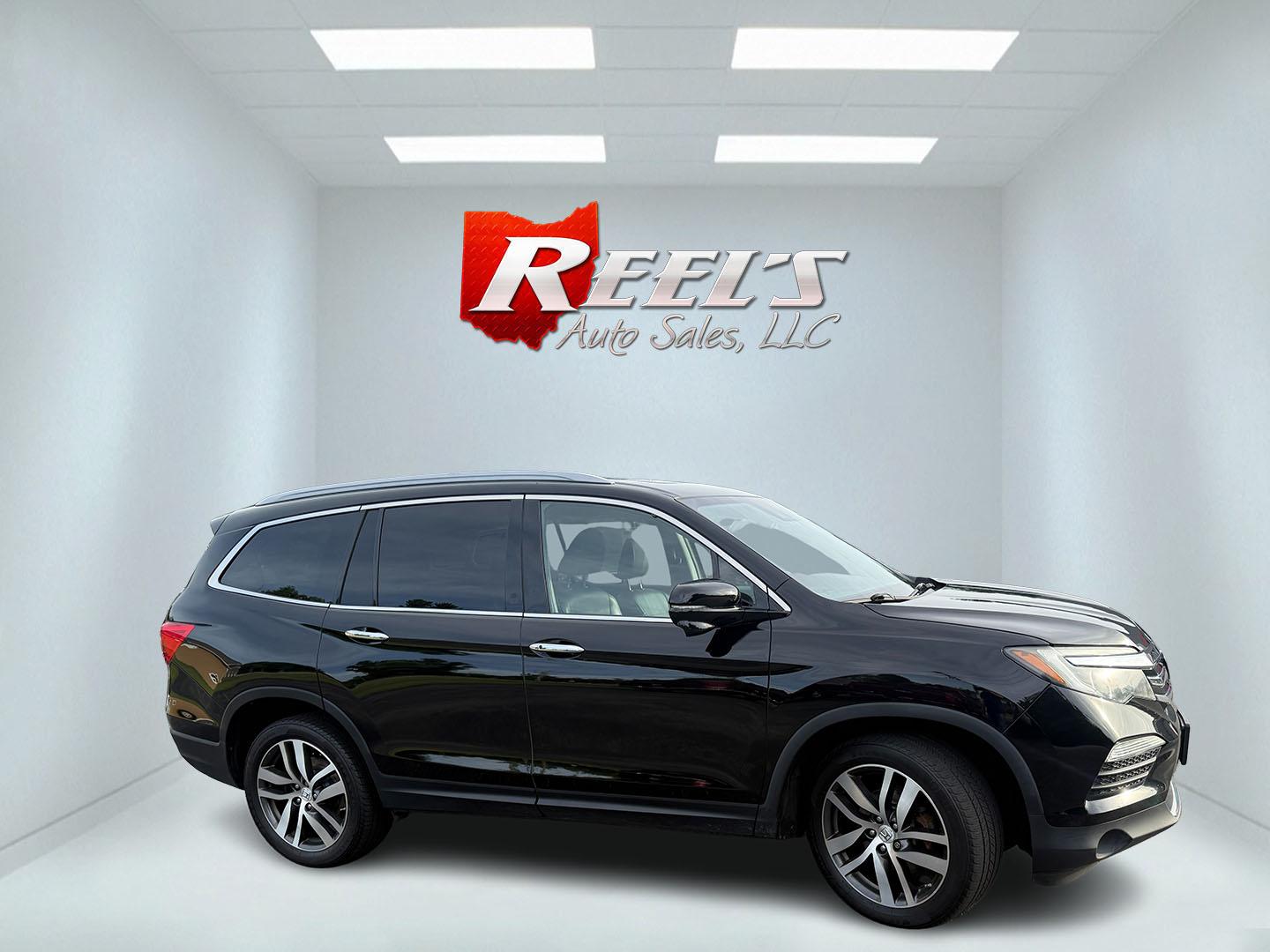 2018 Black /Black Honda Pilot Touring 4WD (5FNYF6H92JB) with an 3.5L V6 SOHC 24V engine, Automatic transmission, located at 547 E. Main St., Orwell, OH, 44076, (440) 437-5893, 41.535435, -80.847855 - 2018 Honda Pilot Touring AWD – Premium 3-Row Family SUV with Leather, Strong V6 Power, and Advanced Safety! This 2018 Honda Pilot Touring AWD is a loaded, upscale 3-row SUV that delivers the perfect combination of comfort, capability, and modern technology. Powered by Honda’s smooth 3.5L Earth- Photo#3