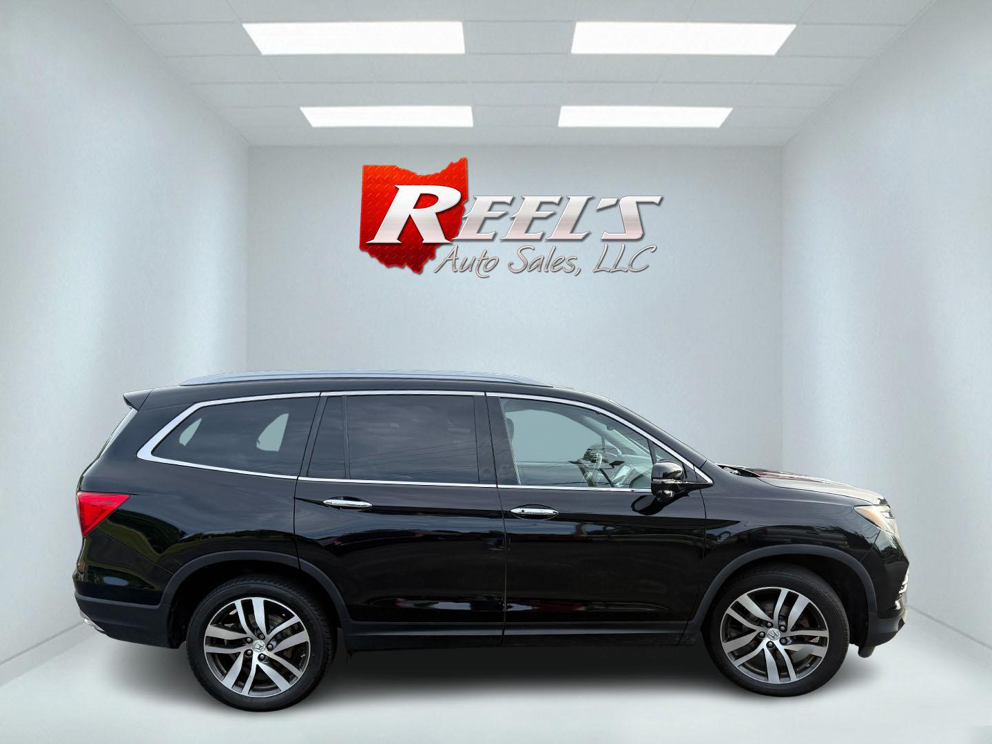 2018 Black /Black Honda Pilot Touring 4WD (5FNYF6H92JB) with an 3.5L V6 SOHC 24V engine, Automatic transmission, located at 547 E. Main St., Orwell, OH, 44076, (440) 437-5893, 41.535435, -80.847855 - 2018 Honda Pilot Touring AWD – Premium 3-Row Family SUV with Leather, Strong V6 Power, and Advanced Safety! This 2018 Honda Pilot Touring AWD is a loaded, upscale 3-row SUV that delivers the perfect combination of comfort, capability, and modern technology. Powered by Honda’s smooth 3.5L Earth- Photo#32