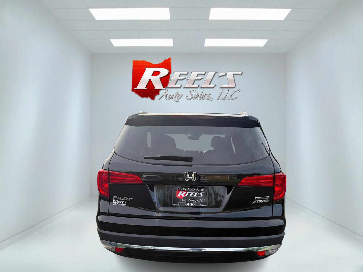 2018 Black /Black Honda Pilot Touring 4WD (5FNYF6H92JB) with an 3.5L V6 SOHC 24V engine, Automatic transmission, located at 547 E. Main St., Orwell, OH, 44076, (440) 437-5893, 41.535435, -80.847855 - 2018 Honda Pilot Touring AWD – Premium 3-Row Family SUV with Leather, Strong V6 Power, and Advanced Safety! This 2018 Honda Pilot Touring AWD is a loaded, upscale 3-row SUV that delivers the perfect combination of comfort, capability, and modern technology. Powered by Honda’s smooth 3.5L Earth- Photo#35