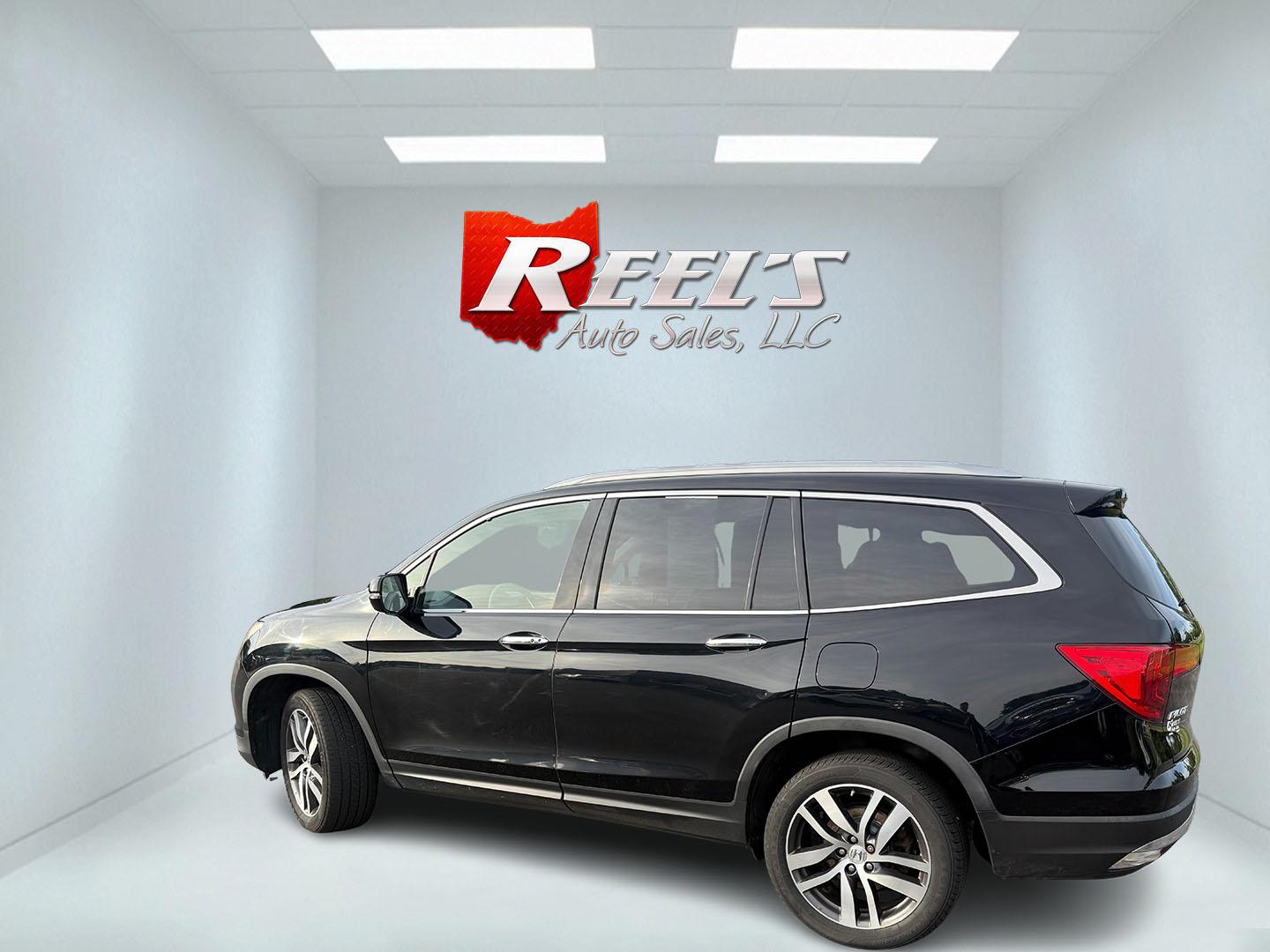 2018 Black /Black Honda Pilot Touring 4WD (5FNYF6H92JB) with an 3.5L V6 SOHC 24V engine, Automatic transmission, located at 547 E. Main St., Orwell, OH, 44076, (440) 437-5893, 41.535435, -80.847855 - 2018 Honda Pilot Touring AWD – Premium 3-Row Family SUV with Leather, Strong V6 Power, and Advanced Safety! This 2018 Honda Pilot Touring AWD is a loaded, upscale 3-row SUV that delivers the perfect combination of comfort, capability, and modern technology. Powered by Honda’s smooth 3.5L Earth- Photo#37
