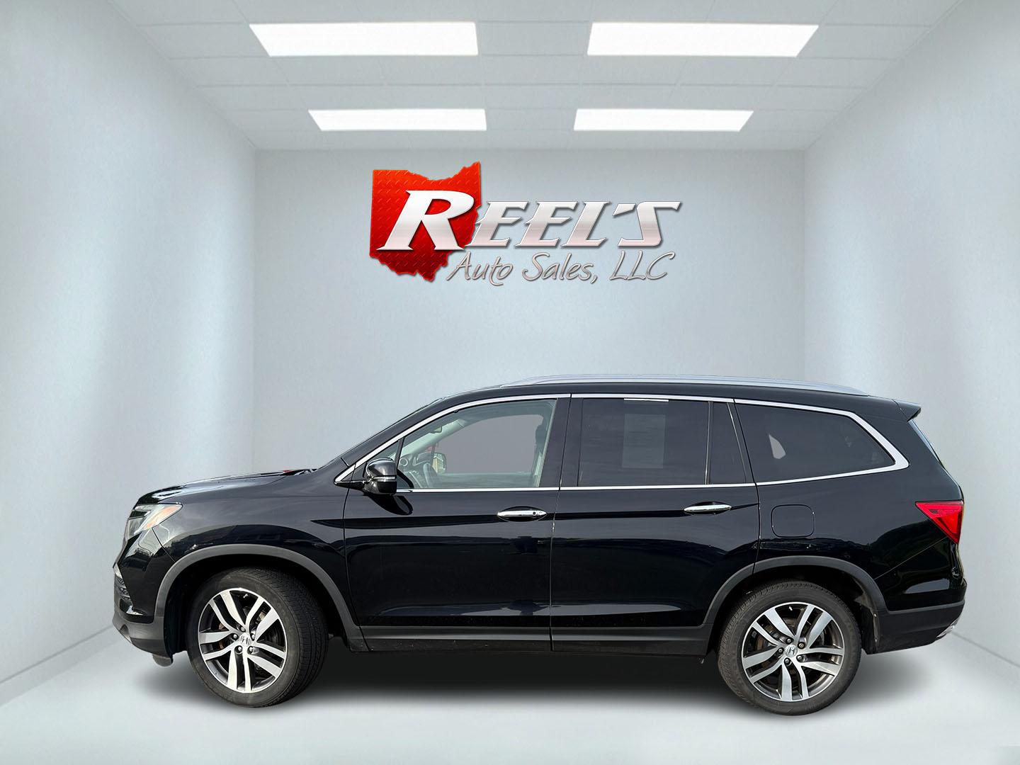 2018 Black /Black Honda Pilot Touring 4WD (5FNYF6H92JB) with an 3.5L V6 SOHC 24V engine, Automatic transmission, located at 547 E. Main St., Orwell, OH, 44076, (440) 437-5893, 41.535435, -80.847855 - 2018 Honda Pilot Touring AWD – Premium 3-Row Family SUV with Leather, Strong V6 Power, and Advanced Safety! This 2018 Honda Pilot Touring AWD is a loaded, upscale 3-row SUV that delivers the perfect combination of comfort, capability, and modern technology. Powered by Honda’s smooth 3.5L Earth- Photo#39