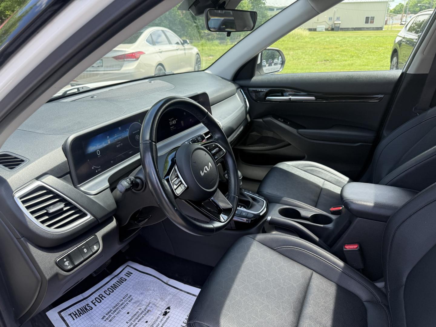 2024 White /Black Kia Seltos EX (KNDERCAA3R7) with an 2.0L I4 DOHC 16V engine, Automatic transmission, located at 547 E. Main St., Orwell, OH, 44076, (440) 437-5893, 41.535435, -80.847855 - 2024 Kia Seltos EX AWD – Stylish, Efficient, and Loaded with Premium Features! This nearly new 2024 Kia Seltos EX AWD is a sharp and versatile compact crossover that offers upscale comfort, confident all-weather performance, and excellent value. Powered by a smooth 2.0L I4 MPI engine paired with- Photo#7