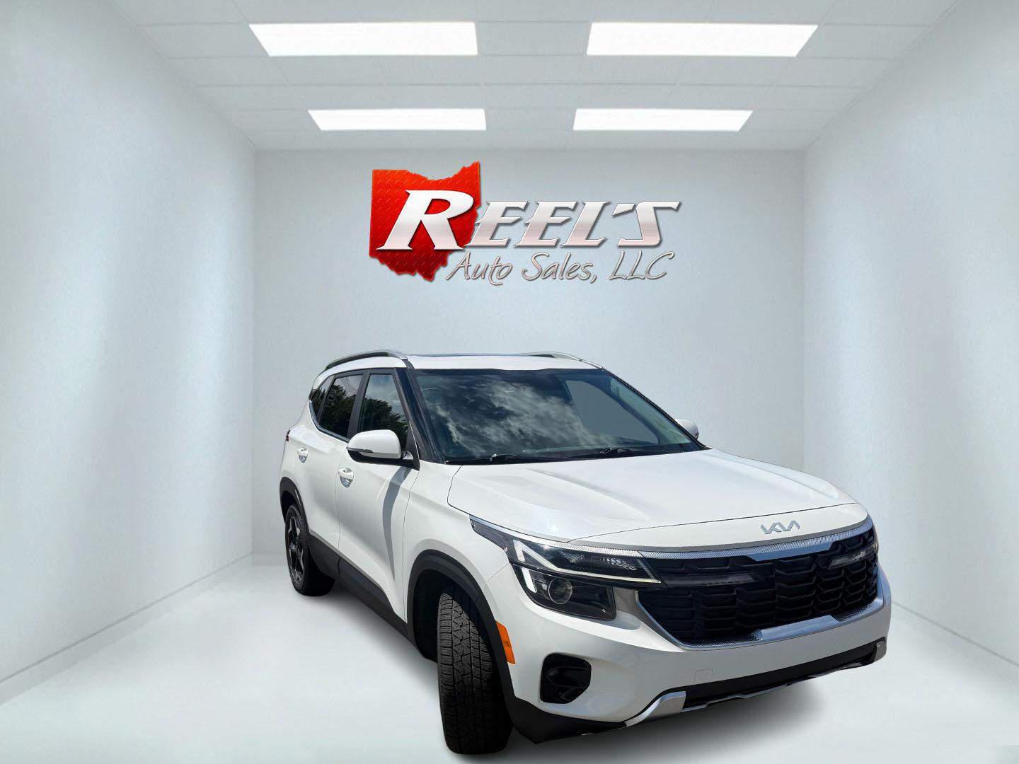 2024 White /Black Kia Seltos EX (KNDERCAA3R7) with an 2.0L I4 DOHC 16V engine, Automatic transmission, located at 547 E. Main St., Orwell, OH, 44076, (440) 437-5893, 41.535435, -80.847855 - 2024 Kia Seltos EX AWD – Stylish, Efficient, and Loaded with Premium Features! This nearly new 2024 Kia Seltos EX AWD is a sharp and versatile compact crossover that offers upscale comfort, confident all-weather performance, and excellent value. Powered by a smooth 2.0L I4 MPI engine paired with- Photo#2