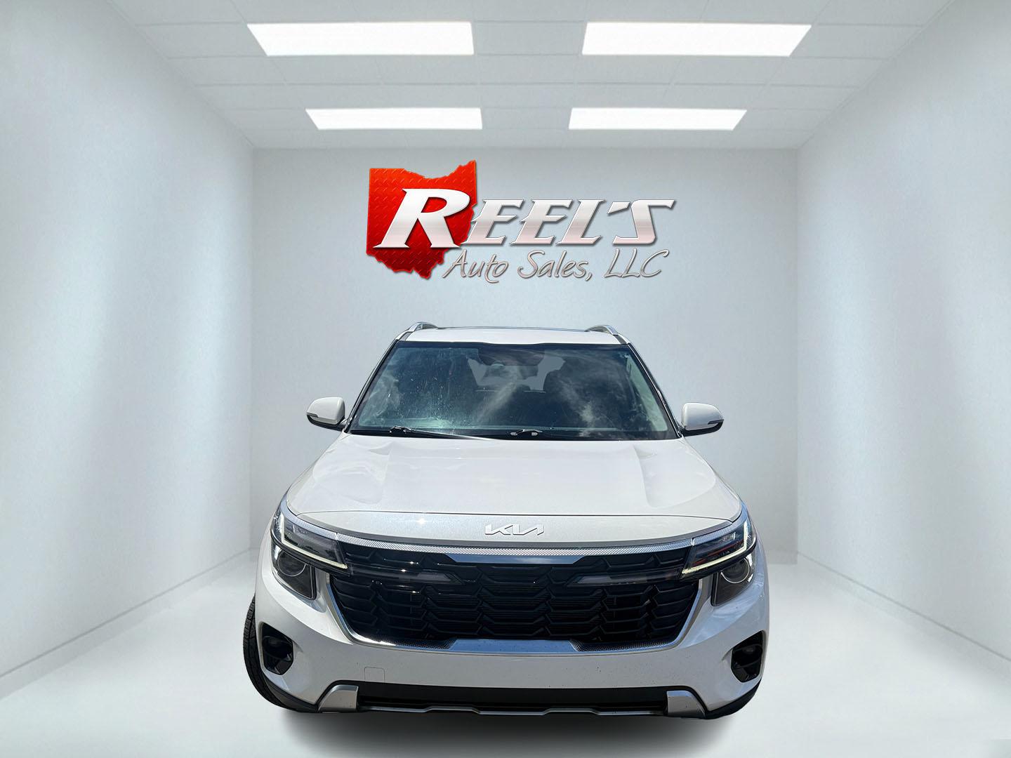 2024 White /Black Kia Seltos EX (KNDERCAA3R7) with an 2.0L I4 DOHC 16V engine, Automatic transmission, located at 547 E. Main St., Orwell, OH, 44076, (440) 437-5893, 41.535435, -80.847855 - 2024 Kia Seltos EX AWD – Stylish, Efficient, and Loaded with Premium Features! This nearly new 2024 Kia Seltos EX AWD is a sharp and versatile compact crossover that offers upscale comfort, confident all-weather performance, and excellent value. Powered by a smooth 2.0L I4 MPI engine paired with- Photo#1