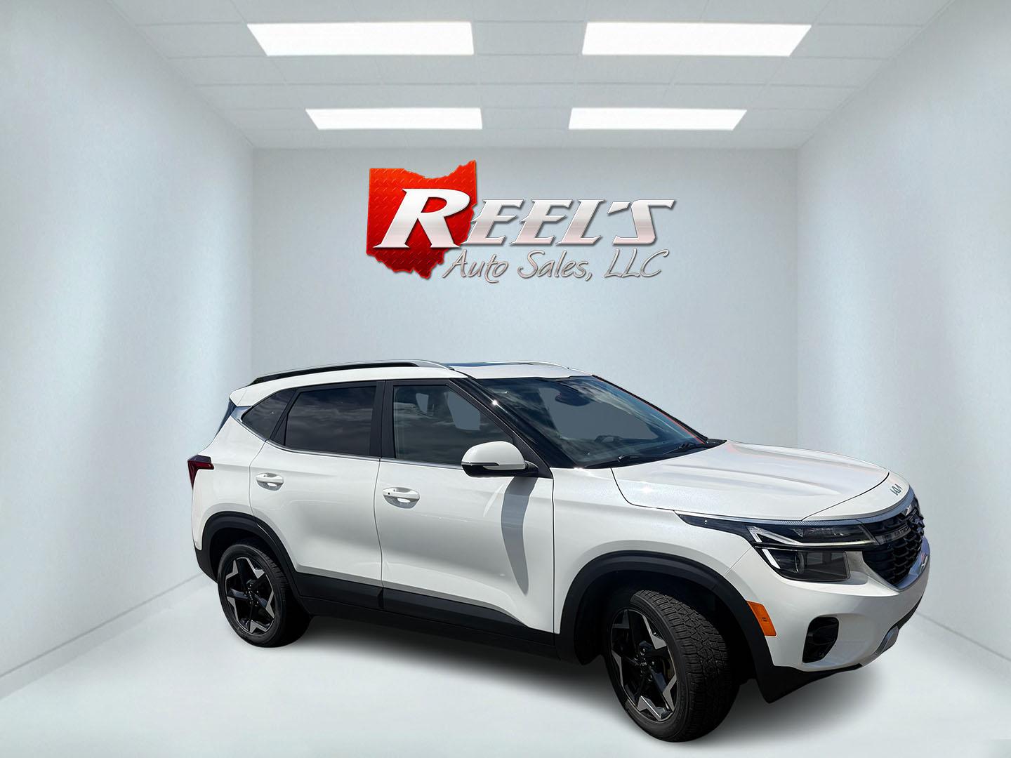2024 White /Black Kia Seltos EX (KNDERCAA3R7) with an 2.0L I4 DOHC 16V engine, Automatic transmission, located at 547 E. Main St., Orwell, OH, 44076, (440) 437-5893, 41.535435, -80.847855 - 2024 Kia Seltos EX AWD – Stylish, Efficient, and Loaded with Premium Features! This nearly new 2024 Kia Seltos EX AWD is a sharp and versatile compact crossover that offers upscale comfort, confident all-weather performance, and excellent value. Powered by a smooth 2.0L I4 MPI engine paired with- Photo#3