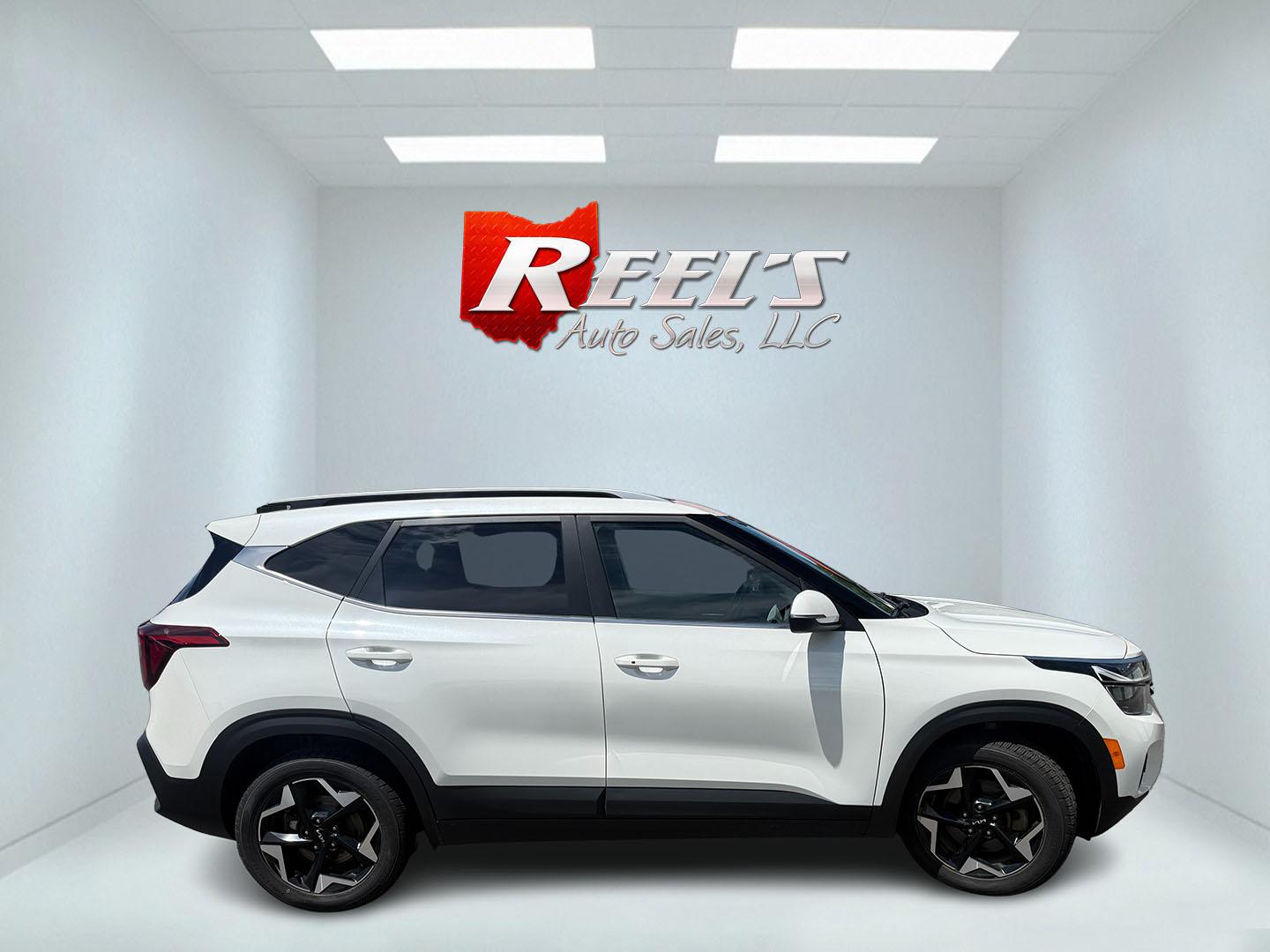 2024 White /Black Kia Seltos EX (KNDERCAA3R7) with an 2.0L I4 DOHC 16V engine, Automatic transmission, located at 547 E. Main St., Orwell, OH, 44076, (440) 437-5893, 41.535435, -80.847855 - 2024 Kia Seltos EX AWD – Stylish, Efficient, and Loaded with Premium Features! This nearly new 2024 Kia Seltos EX AWD is a sharp and versatile compact crossover that offers upscale comfort, confident all-weather performance, and excellent value. Powered by a smooth 2.0L I4 MPI engine paired with- Photo#23