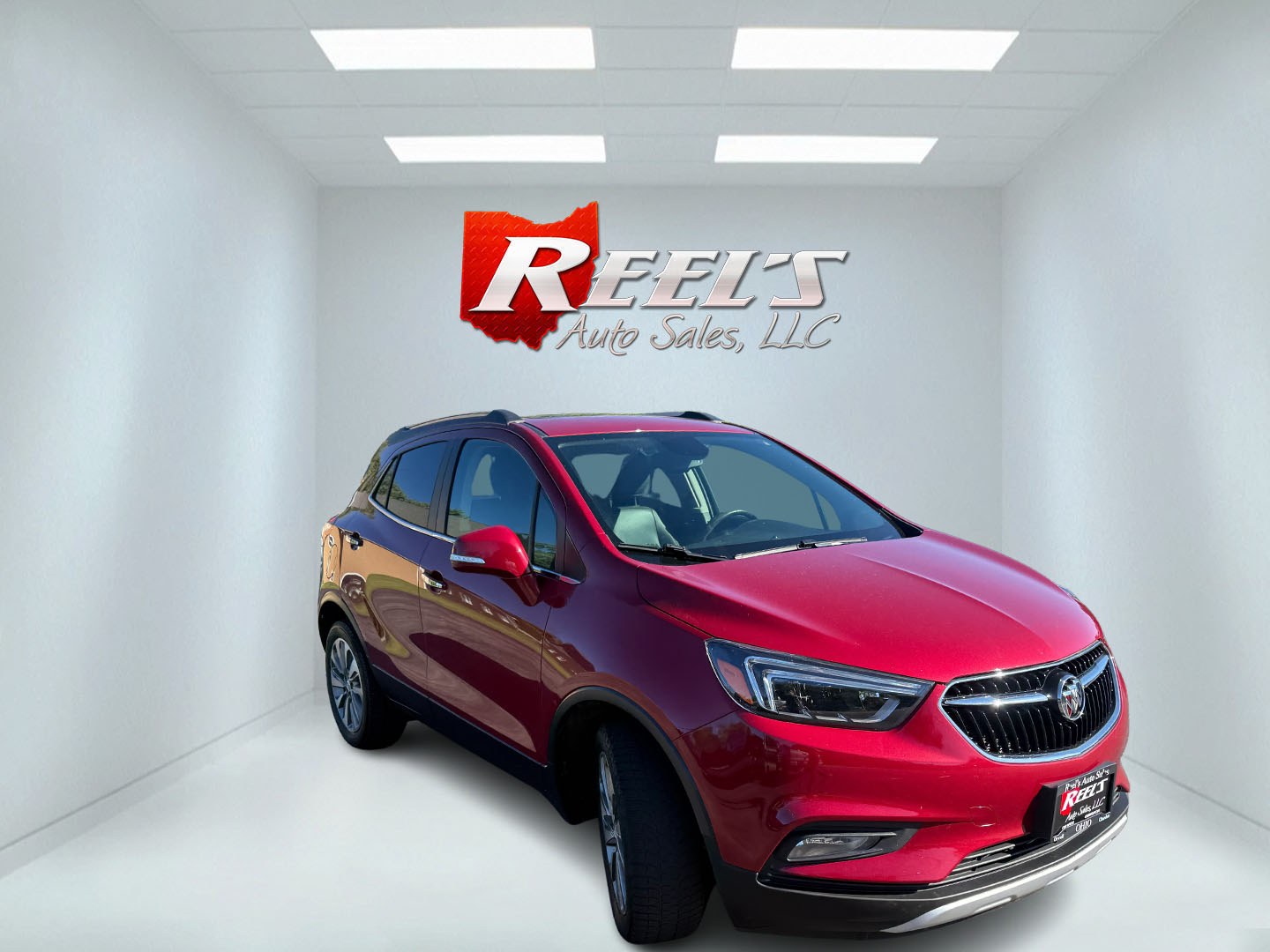 2017 Red /Black Buick Encore Essence FWD (KL4CJCSBXHB) with an 1.4L I4 DOHC 16V TURBO engine, Automatic transmission, located at 11115 Chardon Rd. , Chardon, OH, 44024, (440) 214-9705, 41.580246, -81.241943 - 2017 Buick Encore Essence FWD – Premium Compact Luxury with Leather, Heated Steering Wheel, and Excellent Efficiency! This sharp 2017 Buick Encore Essence FWD is a well-equipped upscale crossover that delivers a quiet, comfortable ride with modern features and strong fuel economy. Powered by a pe- Photo#2