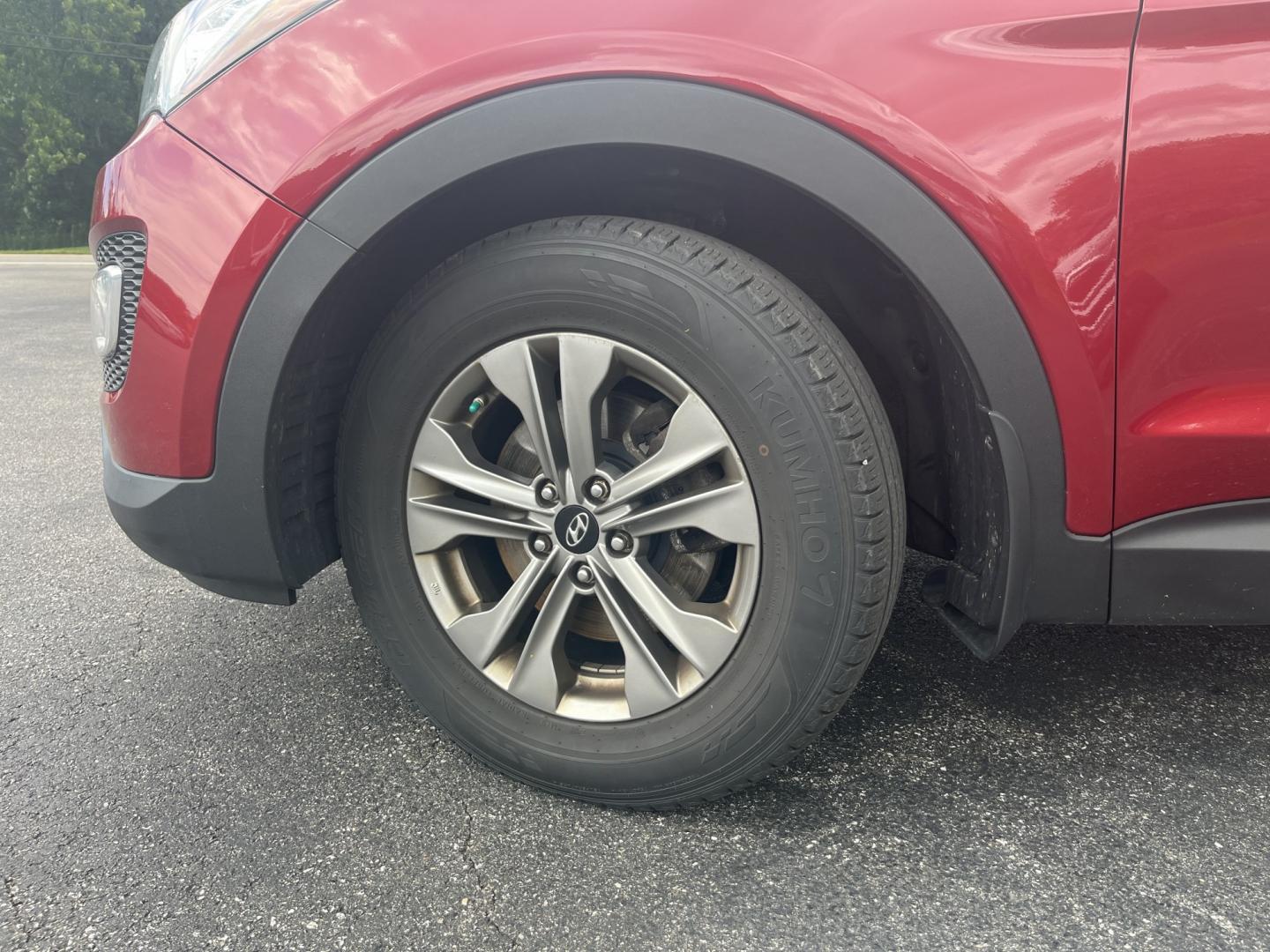 2016 Red /Beige Hyundai Santa Fe Sport 2.4 AWD (5XYZUDLB6GG) with an 2.4L I4 DOHC 16V engine, Automatic transmission, located at 547 E. Main St., Orwell, OH, 44076, (440) 437-5893, 41.535435, -80.847855 - 2016 Hyundai Santa Fe Sport Popular AWD – Loaded with Leather, Luxury Features, and All-Weather Capability! This 2016 Hyundai Santa Fe Sport Popular AWD is a well-equipped midsize SUV that offers the perfect blend of comfort, technology, and confident performance. Powered by a smooth 2.4L GDI I4- Photo#12