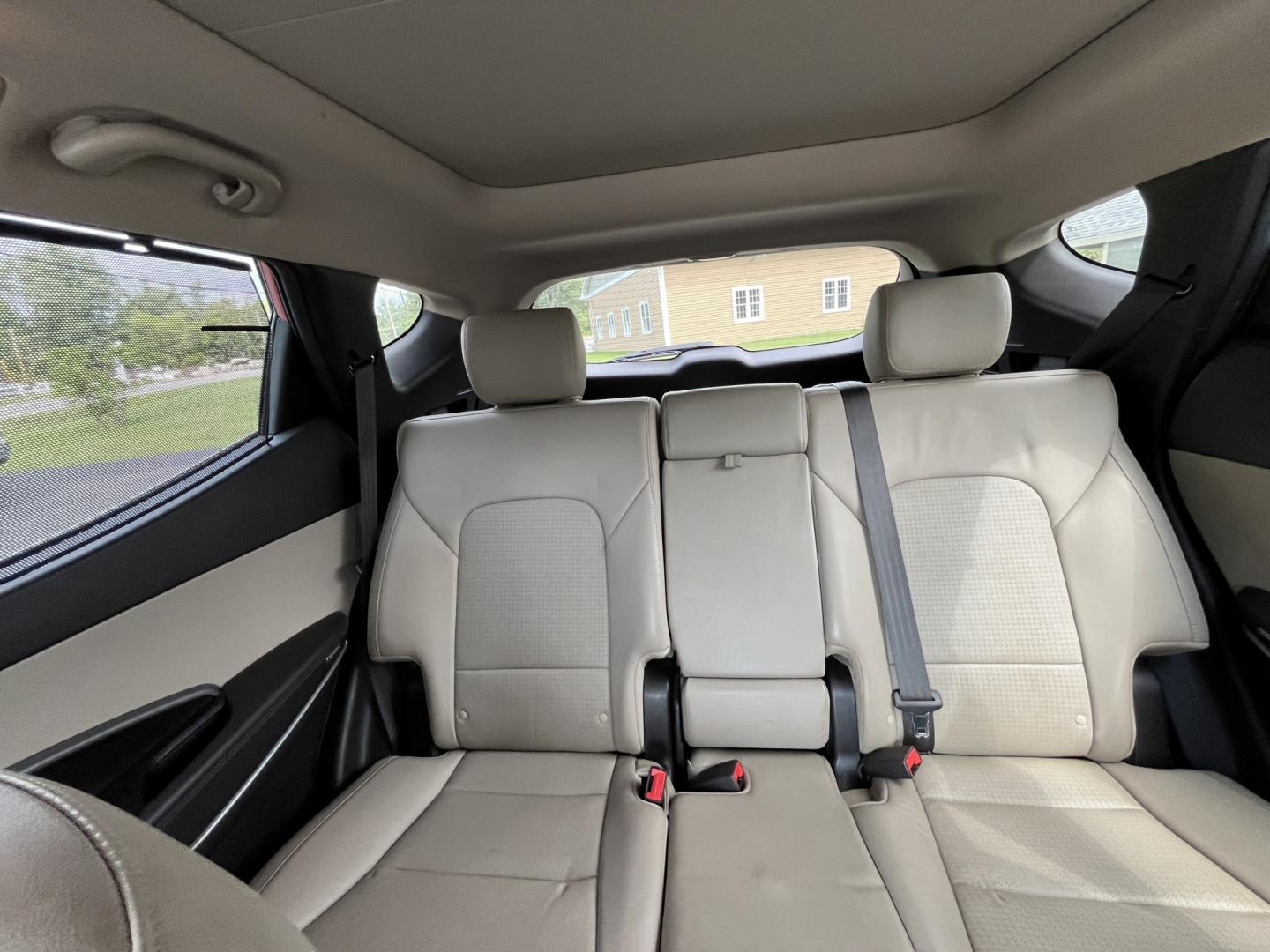 2016 Red /Beige Hyundai Santa Fe Sport 2.4 AWD (5XYZUDLB6GG) with an 2.4L I4 DOHC 16V engine, Automatic transmission, located at 547 E. Main St., Orwell, OH, 44076, (440) 437-5893, 41.535435, -80.847855 - 2016 Hyundai Santa Fe Sport Popular AWD – Loaded with Leather, Luxury Features, and All-Weather Capability! This 2016 Hyundai Santa Fe Sport Popular AWD is a well-equipped midsize SUV that offers the perfect blend of comfort, technology, and confident performance. Powered by a smooth 2.4L GDI I4- Photo#27
